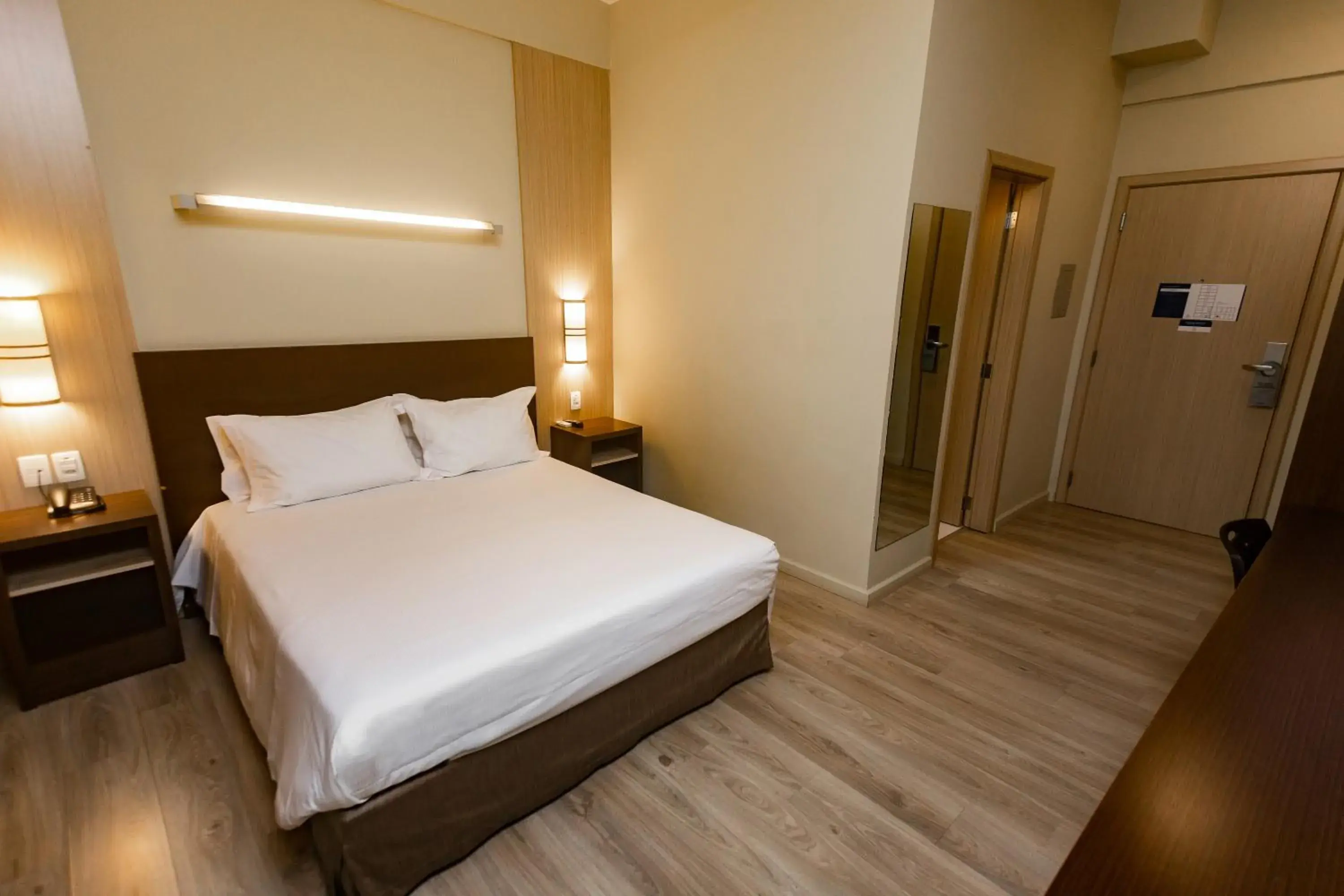 Bed in Master Cosmopolitan Moinhos de Vento Bed in Master Cosmopolitan Moinhos de Vento