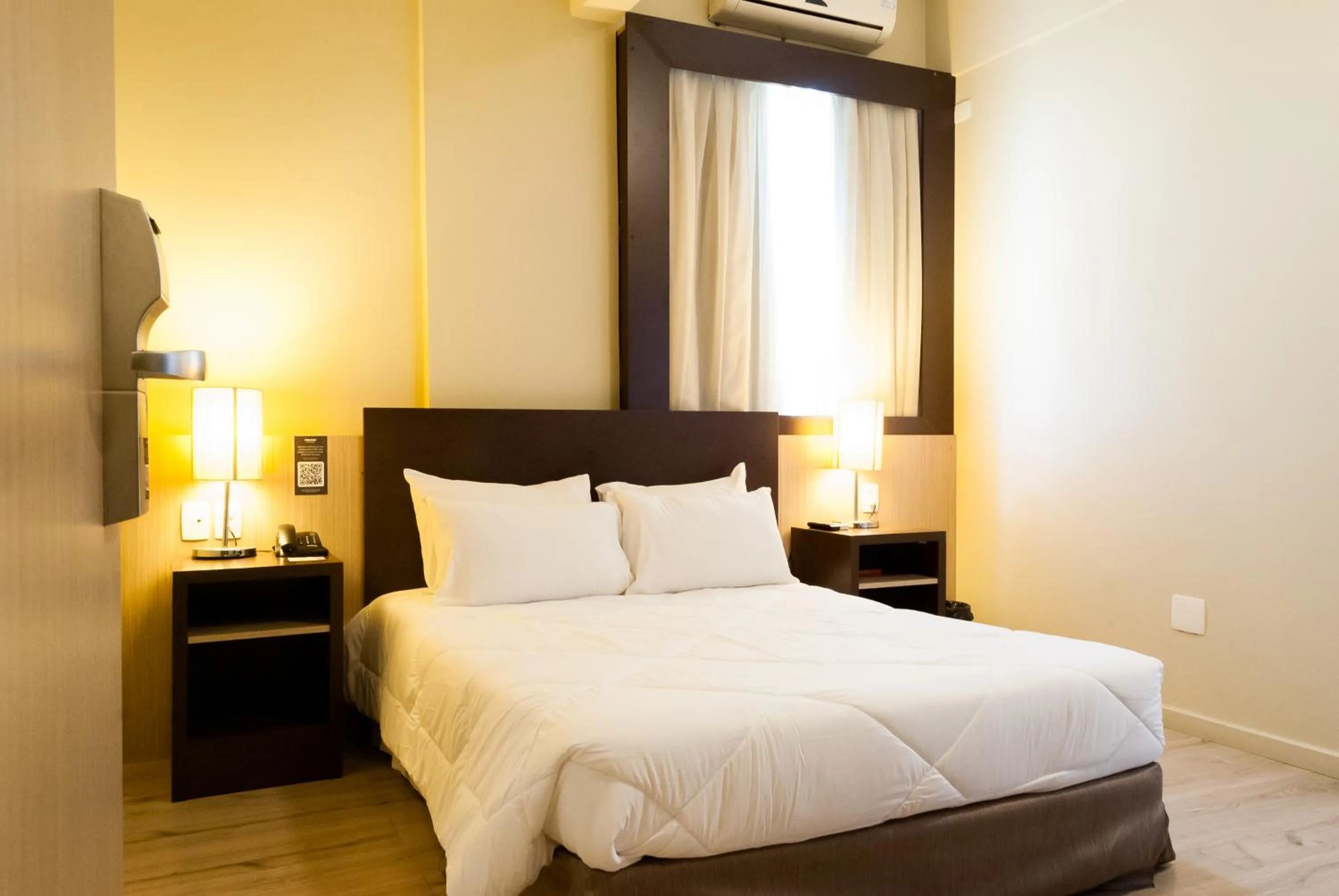 Bed in Master Cosmopolitan Moinhos de Vento