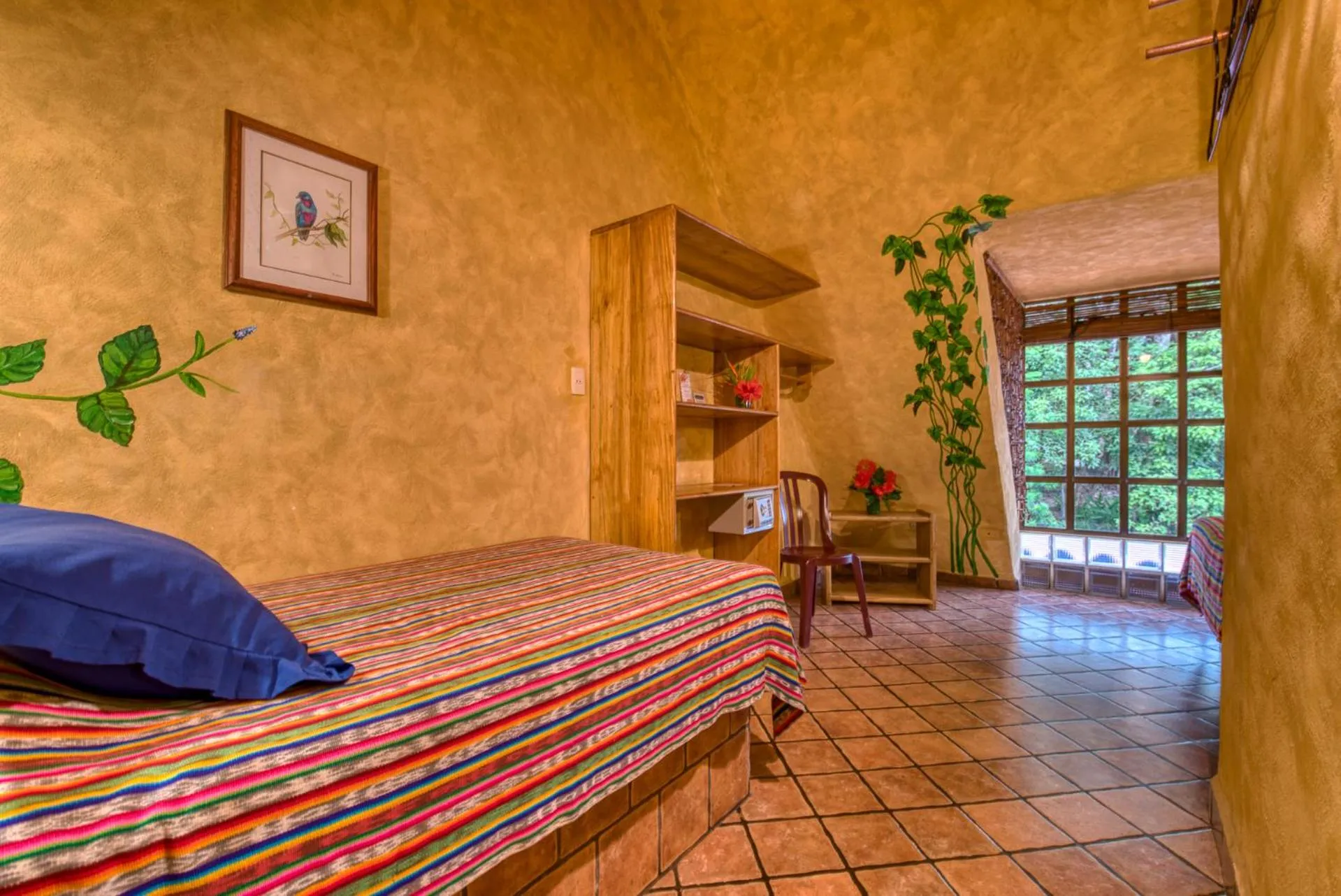 Bed in El Sano Banano Beachside Hotel