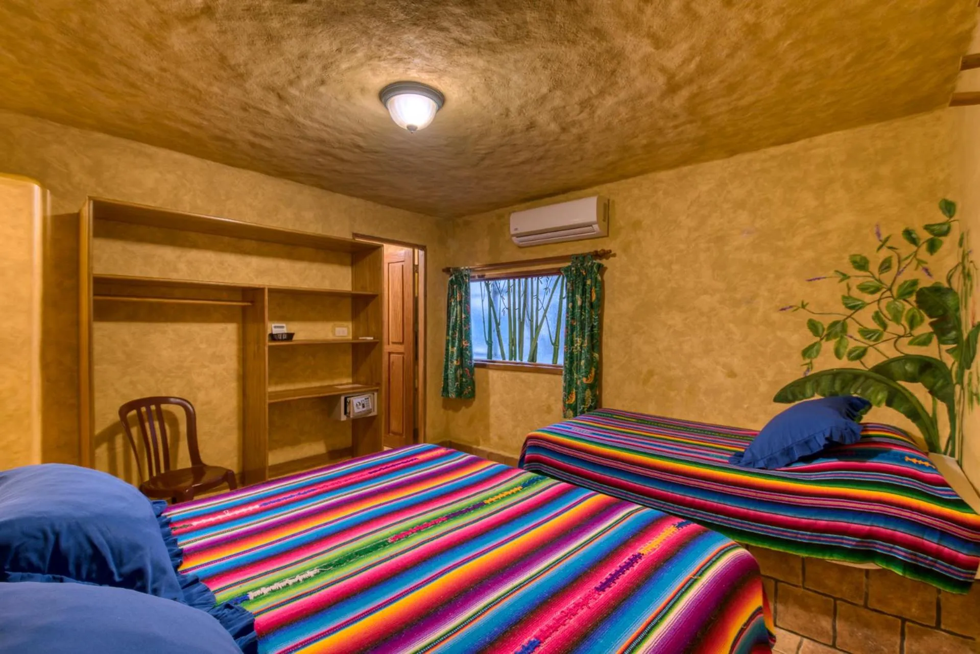 Bed in El Sano Banano Beachside Hotel