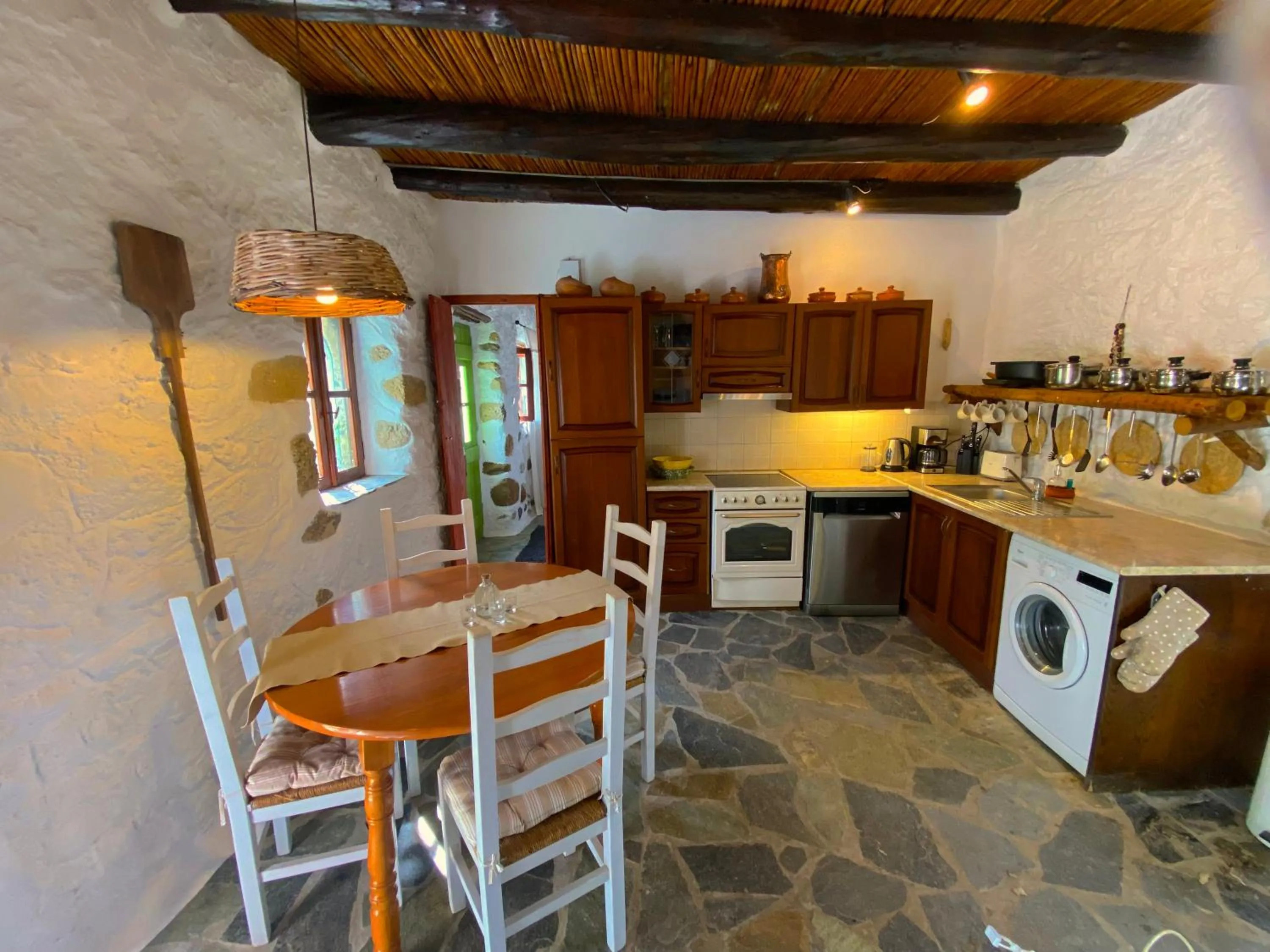 Kitchen or kitchenette in Natura cottages