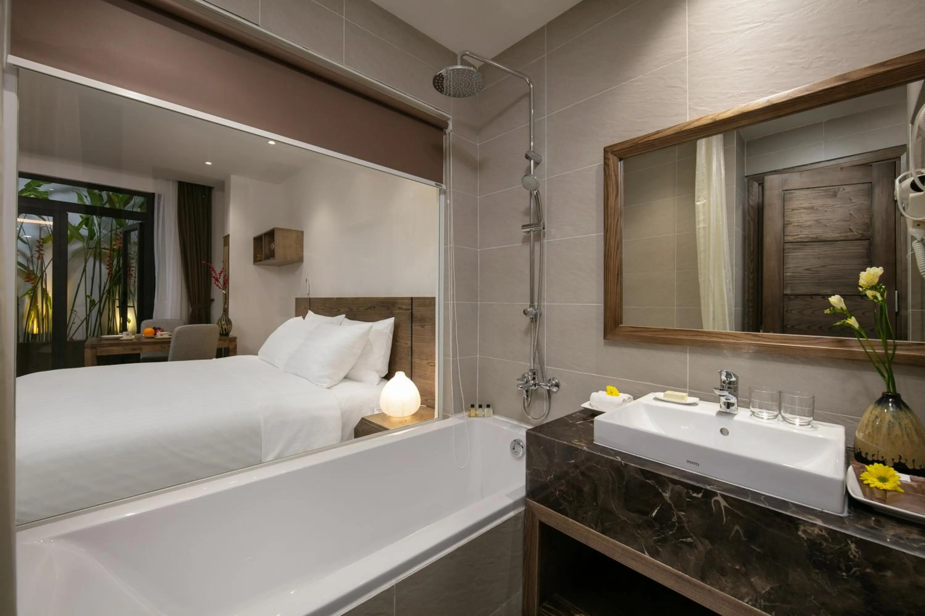 Shower, Bed in The Bloom Pham Viet Chanh - Modern Living Space in Saigon - A Top Choice for Western Travelers