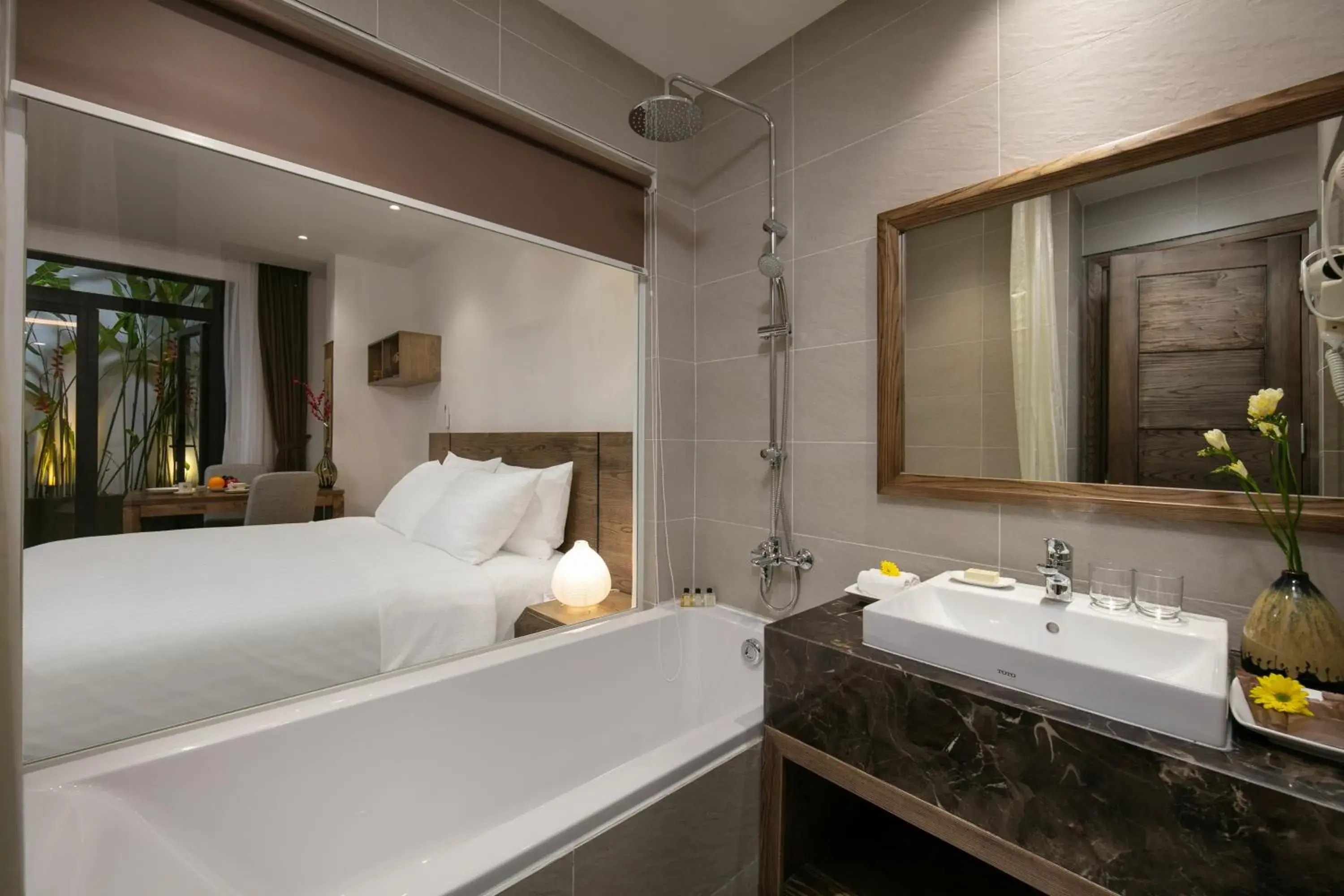 Shower, Bed in The Bloom Pham Viet Chanh - Modern Living Space in Saigon - A Top Choice for Western Travelers Shower, Bed in The Bloom Pham Viet Chanh - Modern Living Space in Saigon - A Top Choice for Western Travelers