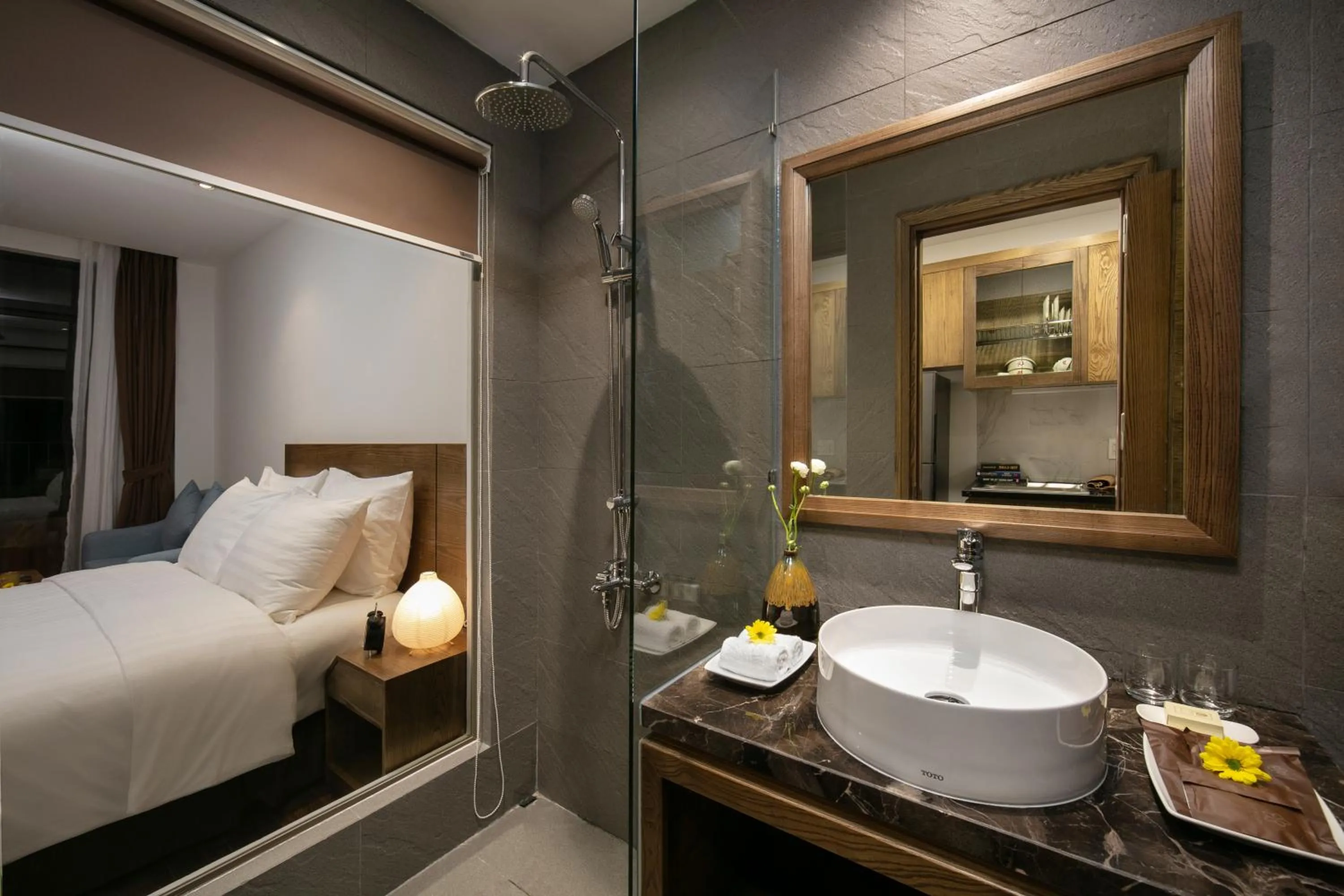 Shower, Bed in The Bloom Pham Viet Chanh - Modern Living Space in Saigon - A Top Choice for Western Travelers