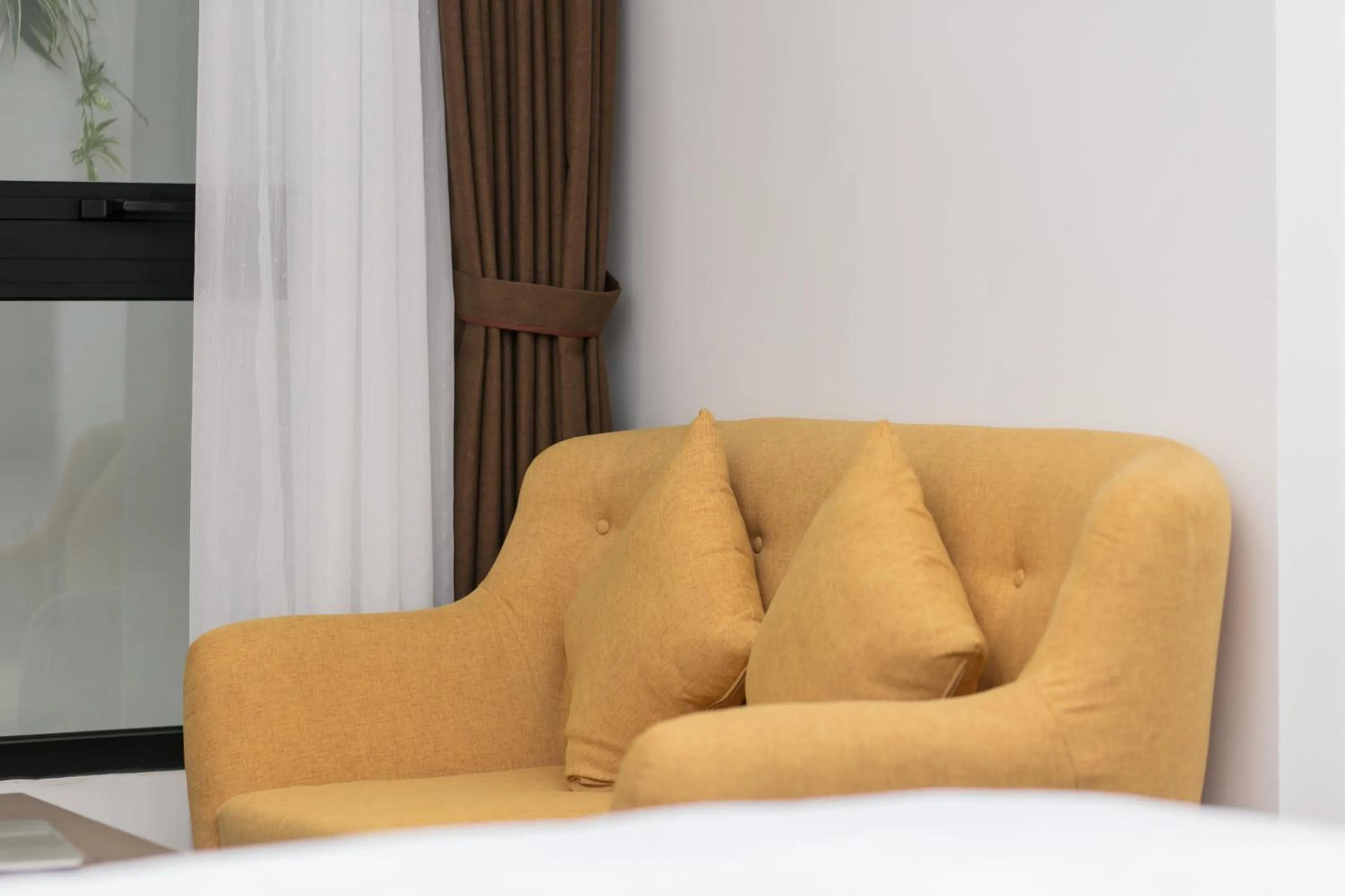 Seating area in The Bloom Pham Viet Chanh - Modern Living Space in Saigon - A Top Choice for Western Travelers