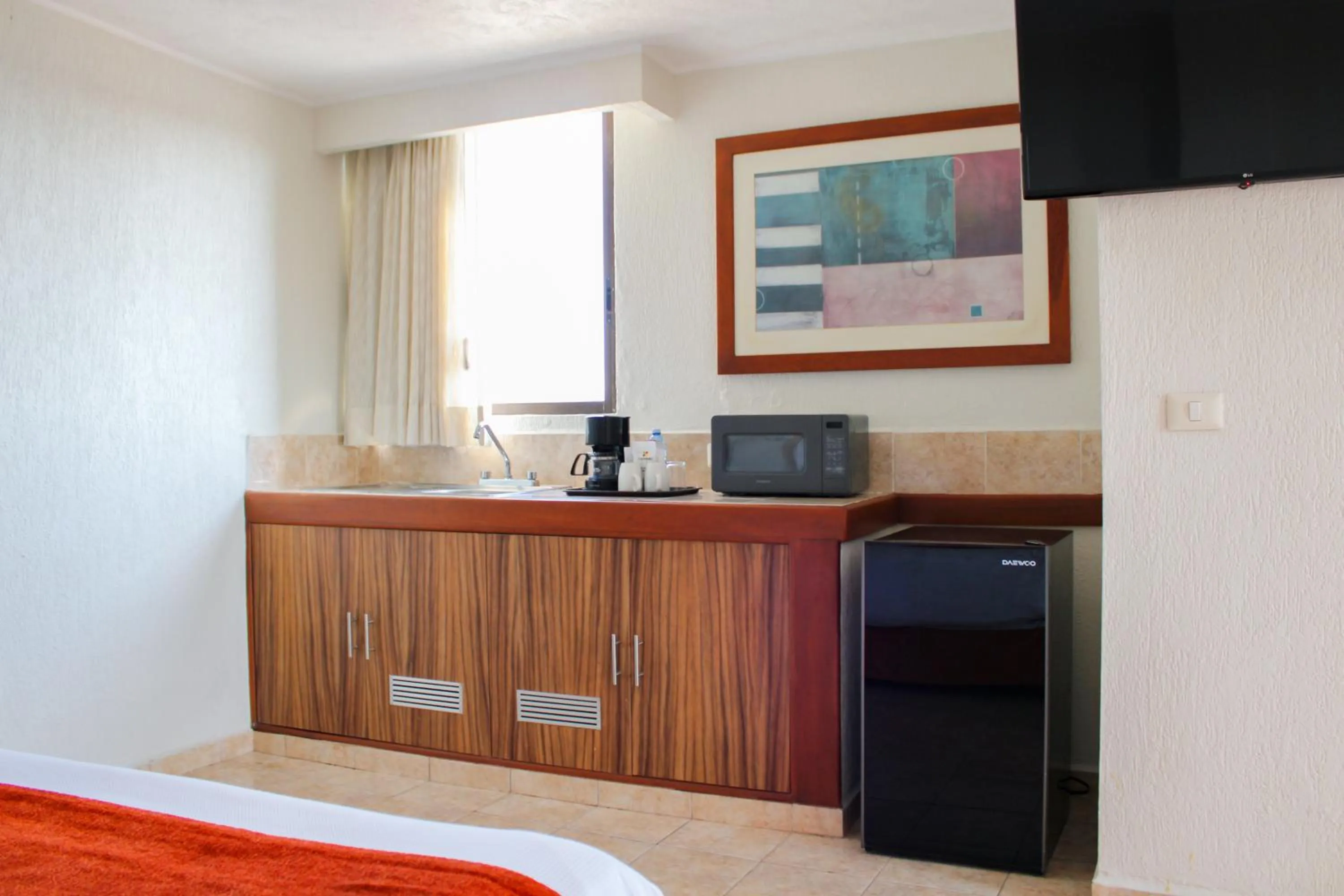 Coffee/tea facilities, Bed in Hotel & Suites Real del Lago