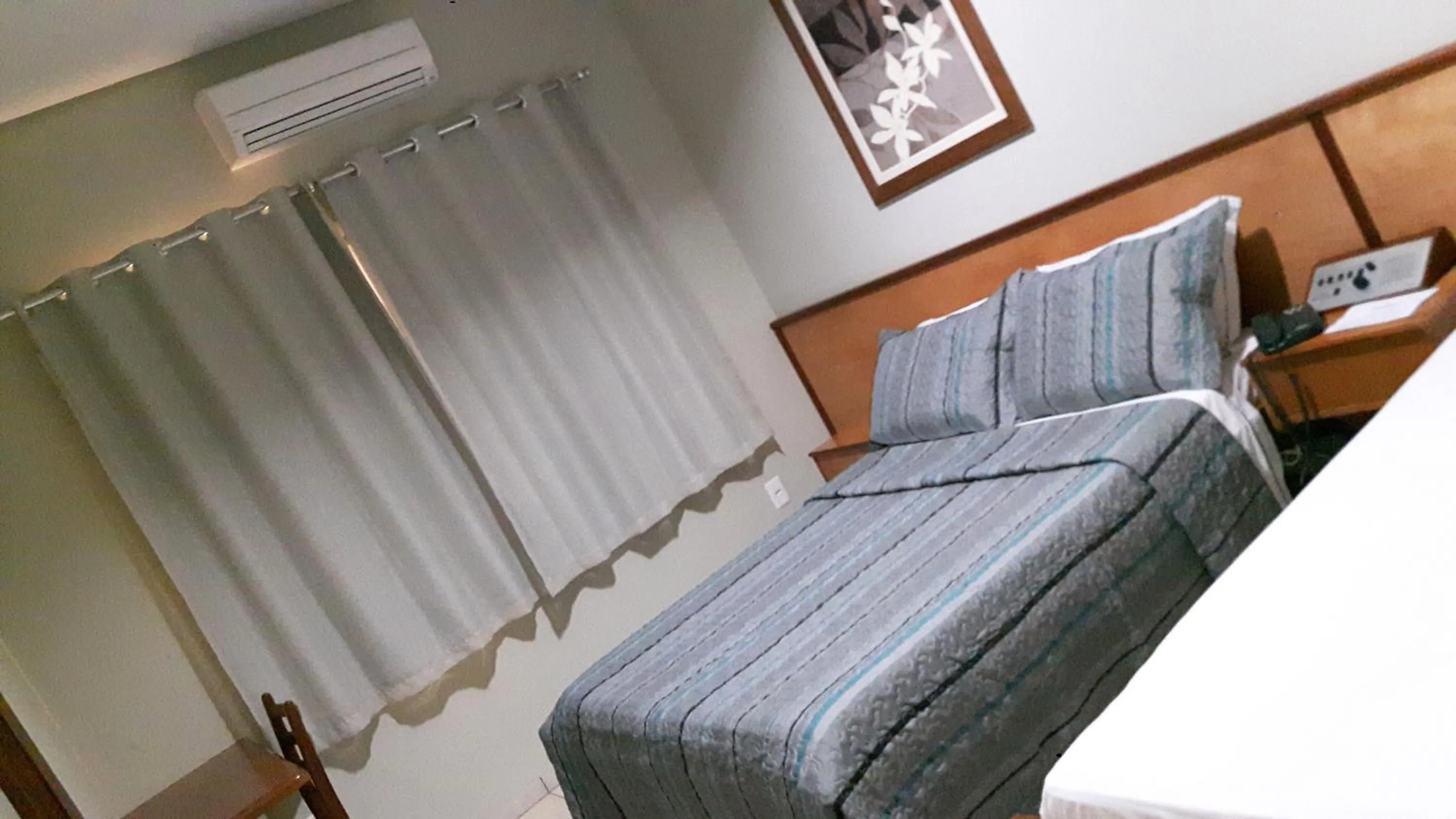 Bed in Hotel Executivo
