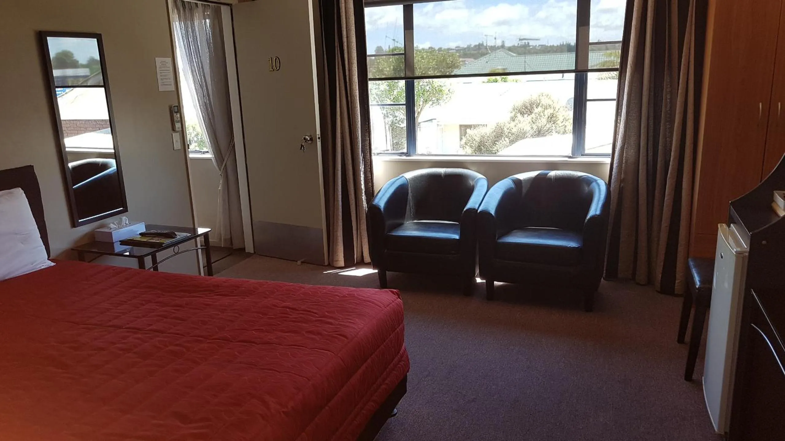 Bed in Palm Court Motel