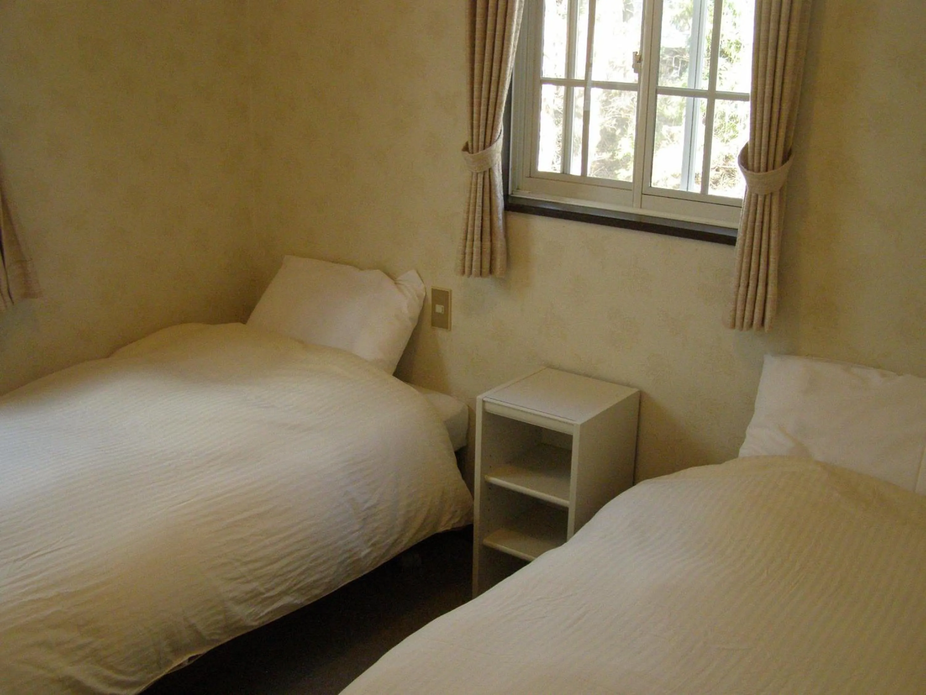 Bed in Sunny Side Hut