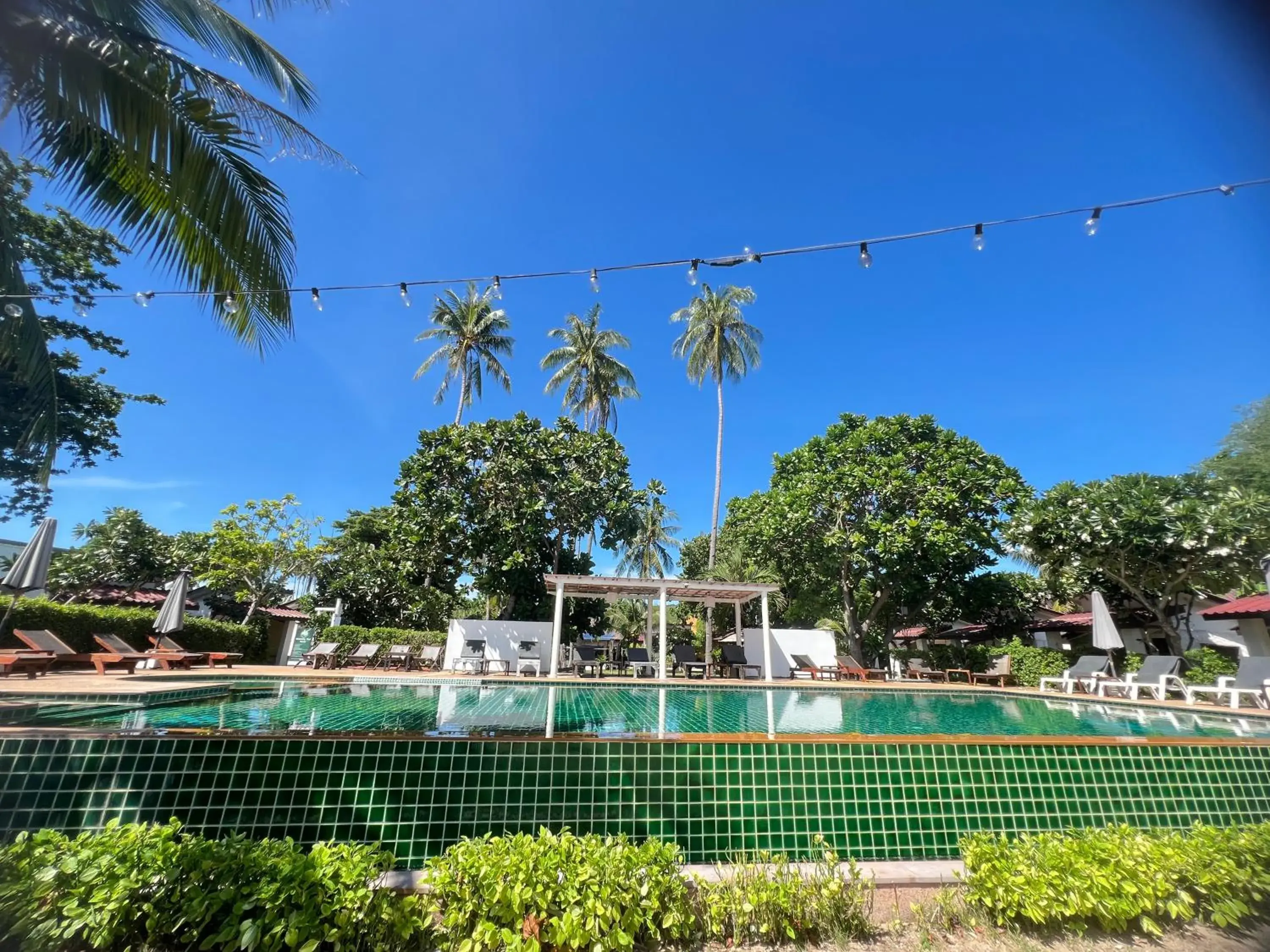 Swimming pool in Coco Lanta Resort - SHA Extra Plus Swimming pool in Coco Lanta Resort - SHA Extra Plus