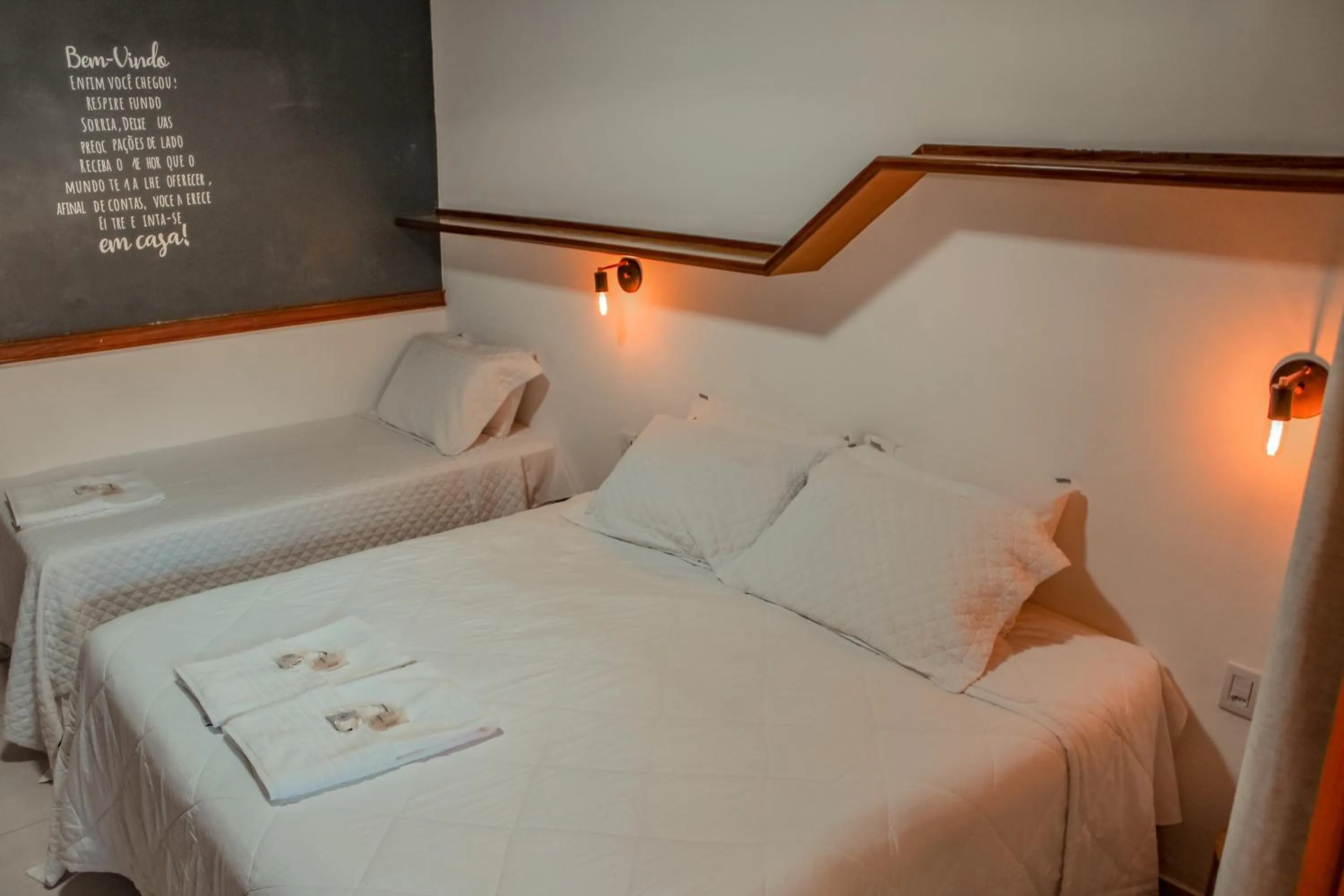 Photo of the whole room, Bed in Pousada Quintal da Lua