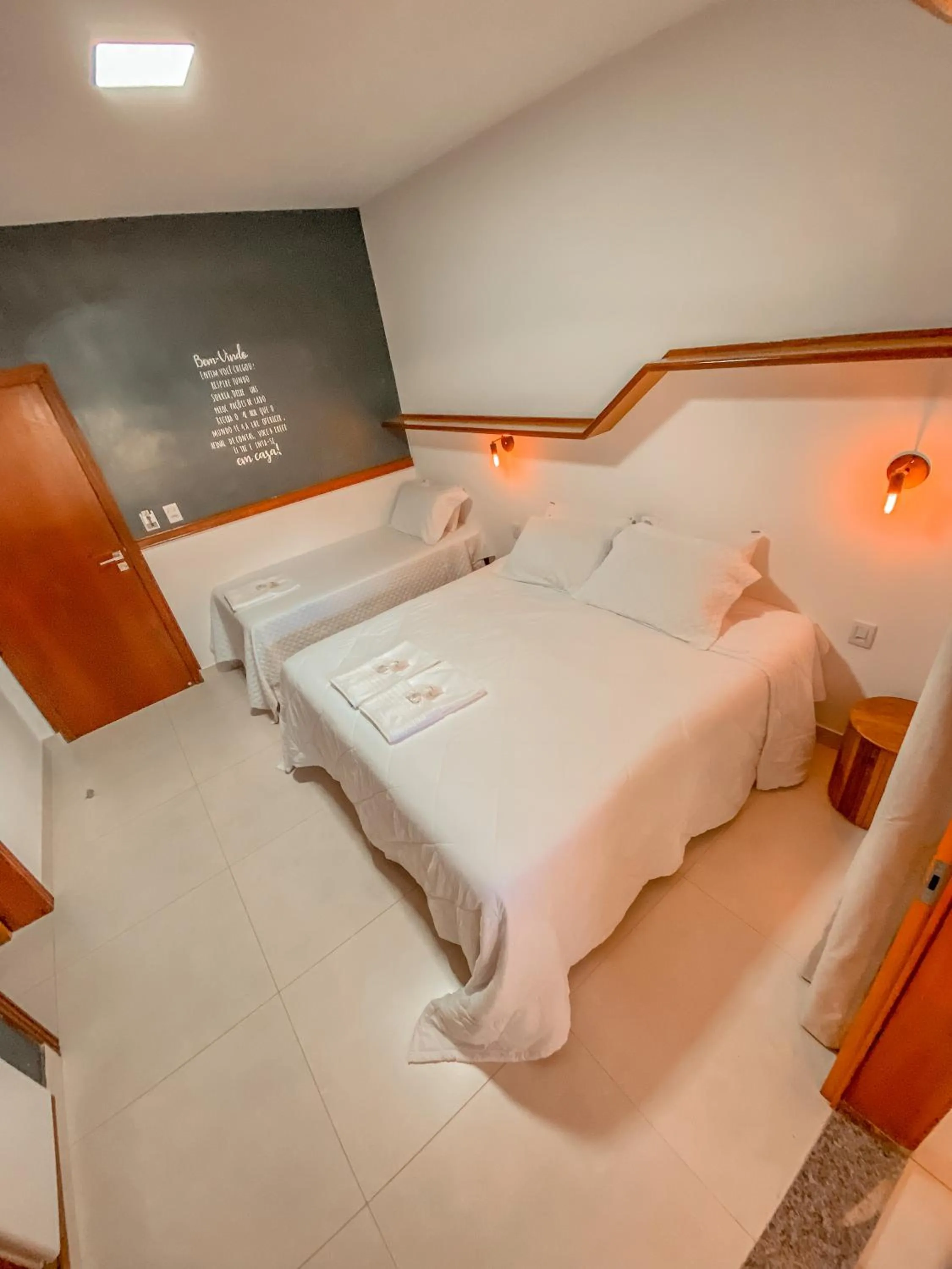 Photo of the whole room, Bed in Pousada Quintal da Lua