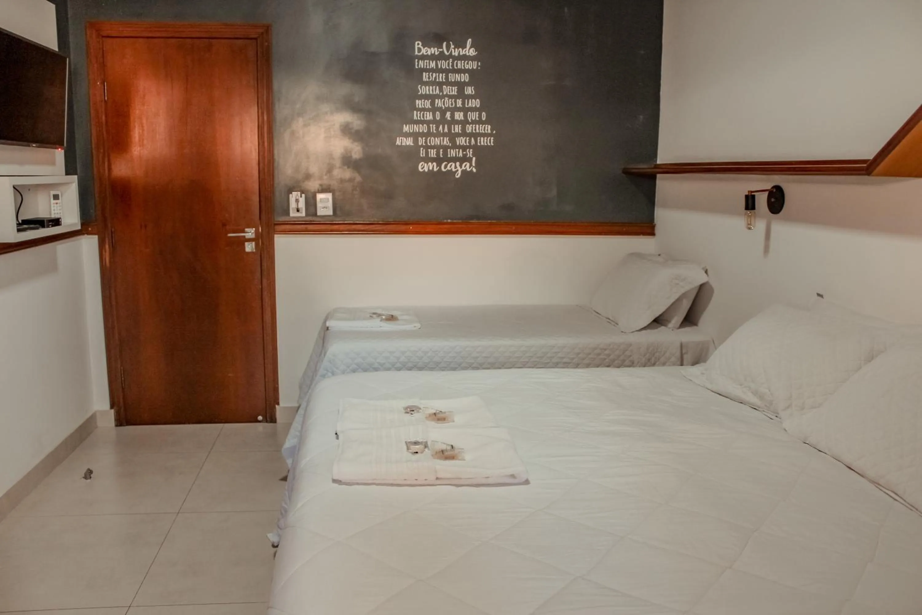 Photo of the whole room, Bed in Pousada Quintal da Lua