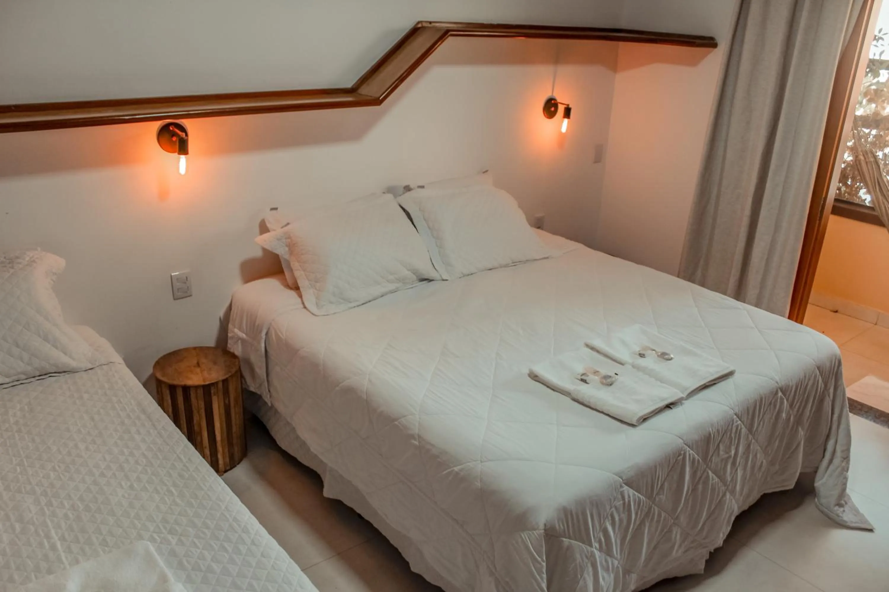 Photo of the whole room, Bed in Pousada Quintal da Lua