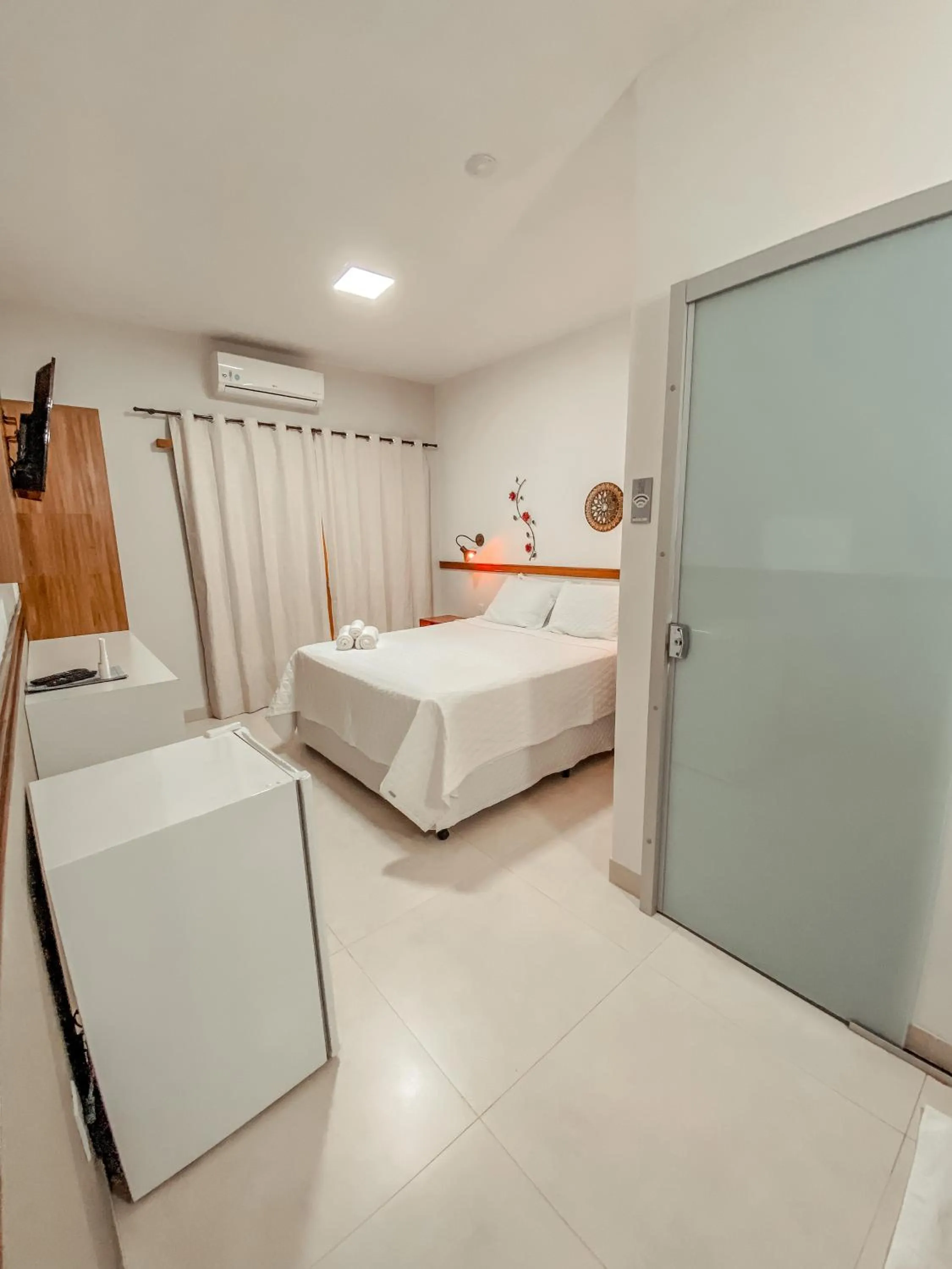 Photo of the whole room, Bed in Pousada Quintal da Lua