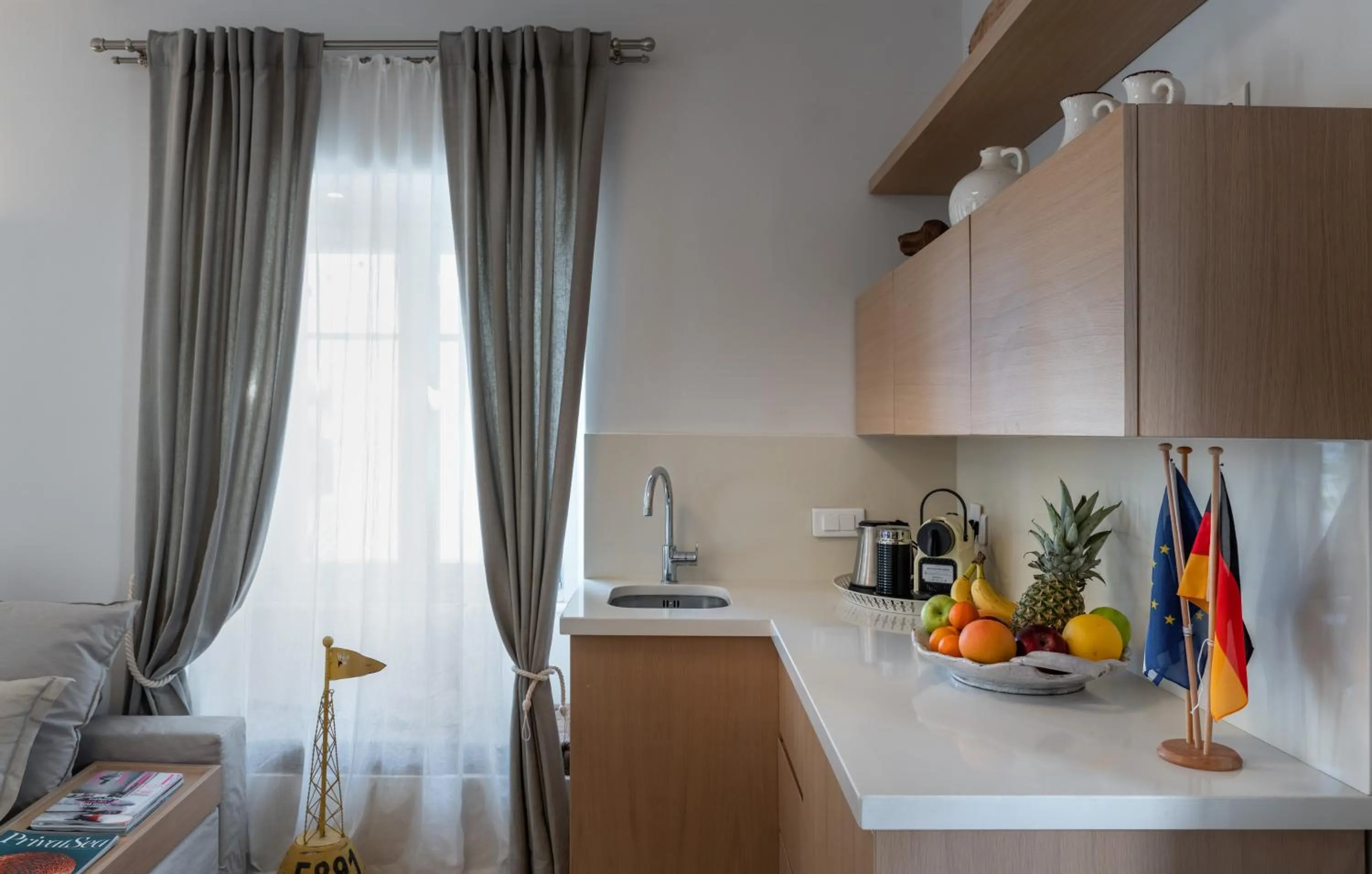 Kitchen or kitchenette in Porto Vecchio Luxury Suites