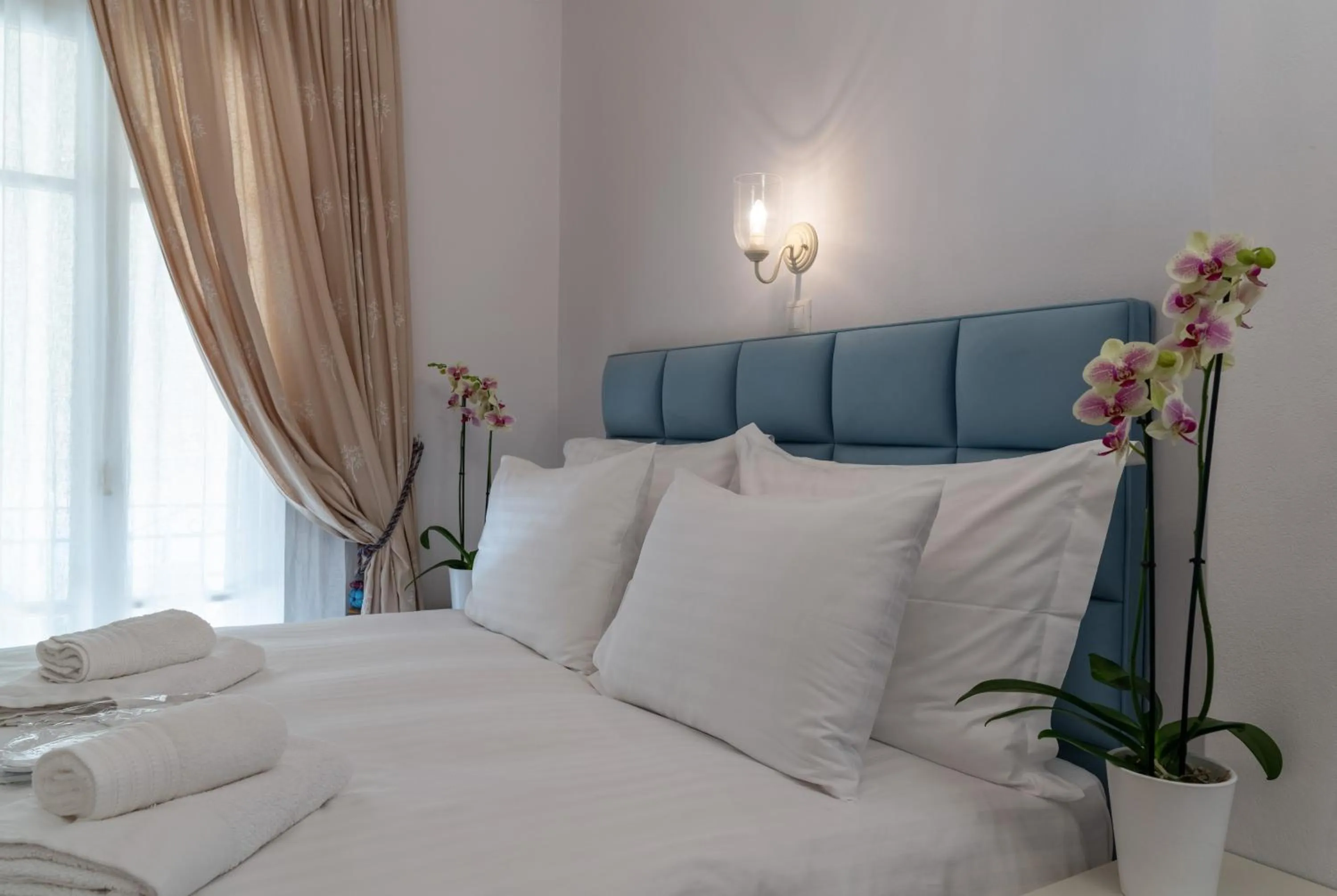 Bed in Porto Vecchio Luxury Suites