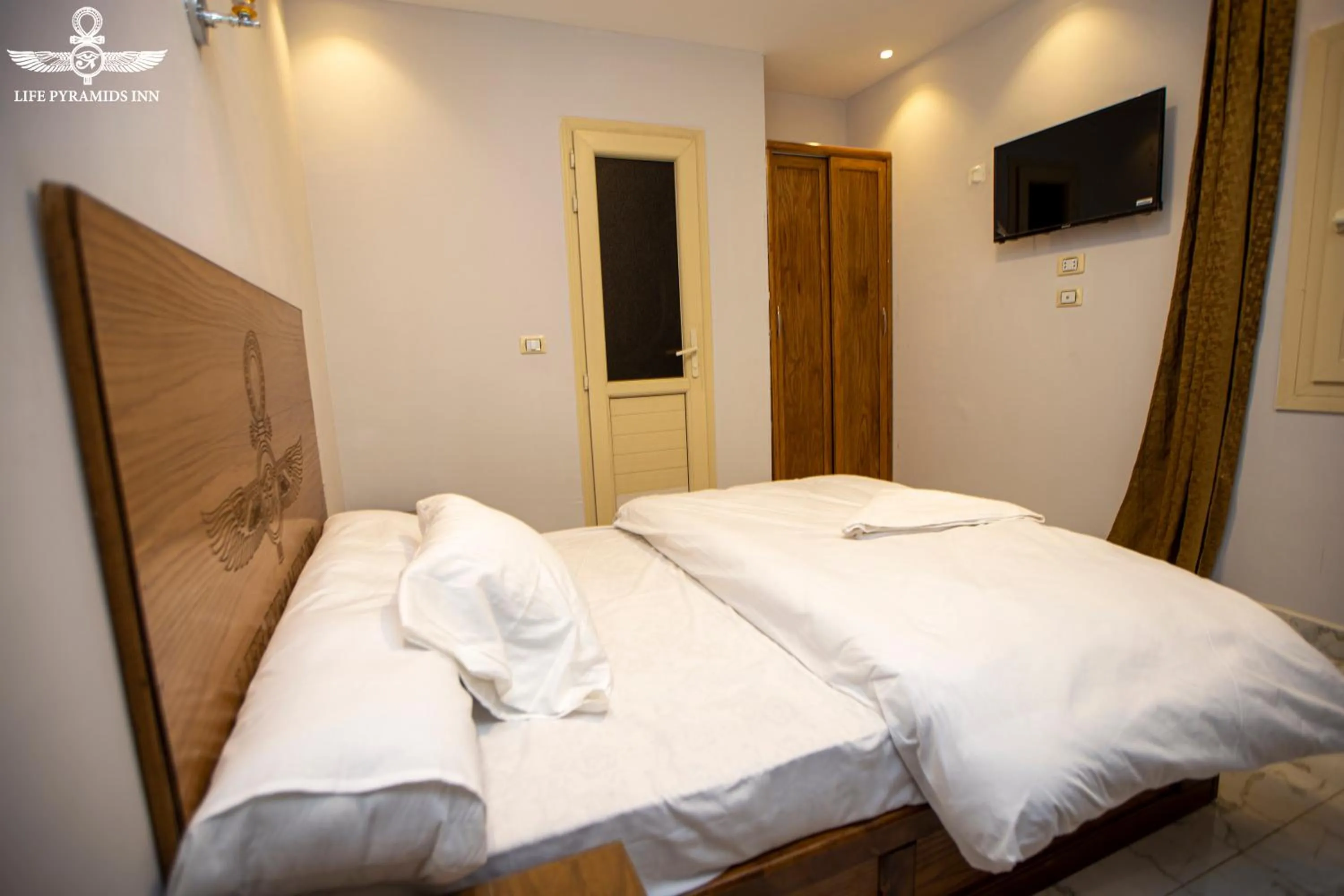 Bed in Life Pyramids Inn