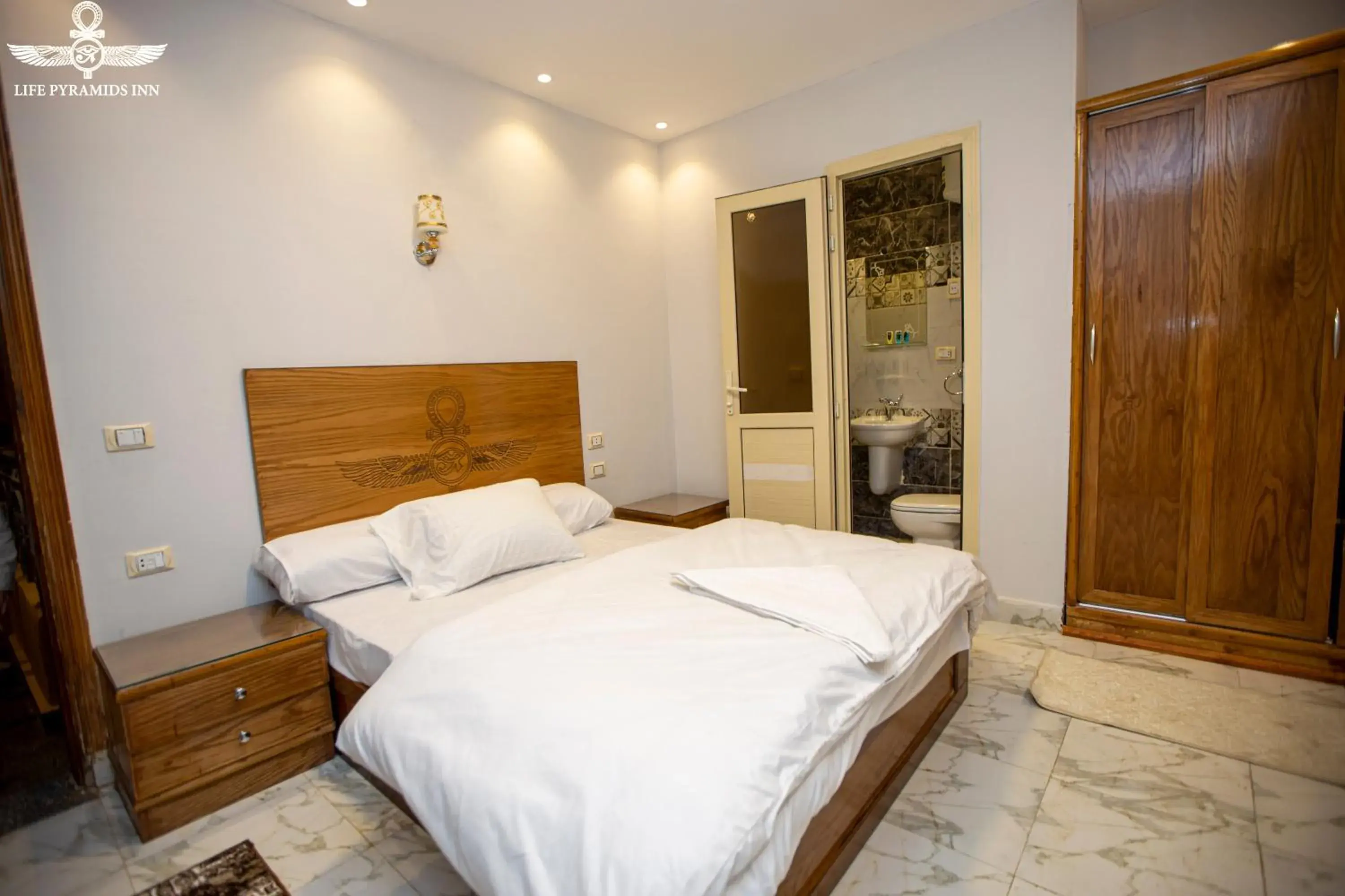 Deluxe King Room - single occupancy in Life Pyramids Inn Deluxe King Room - single occupancy in Life Pyramids Inn