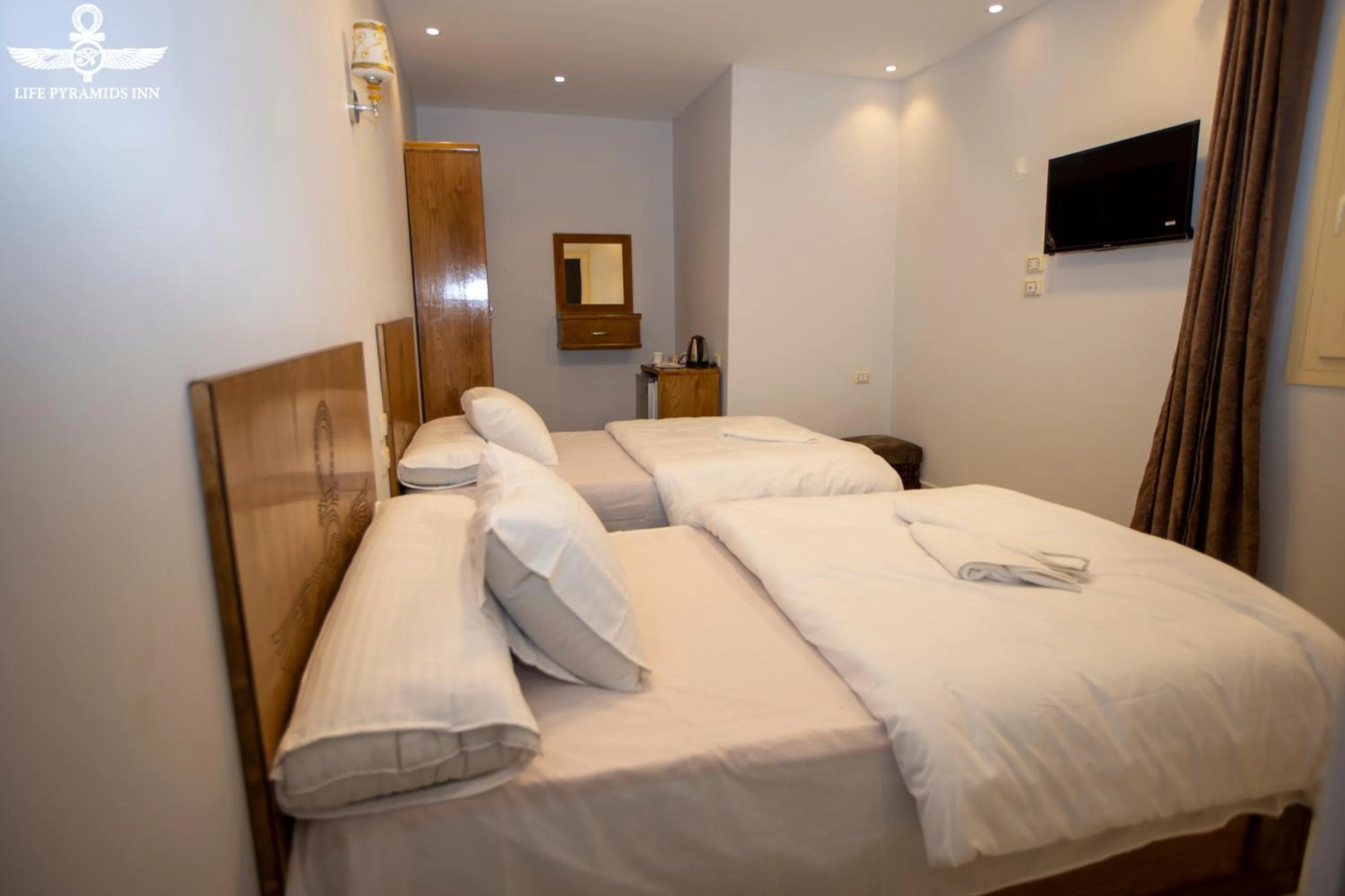 Bed in Life Pyramids Inn