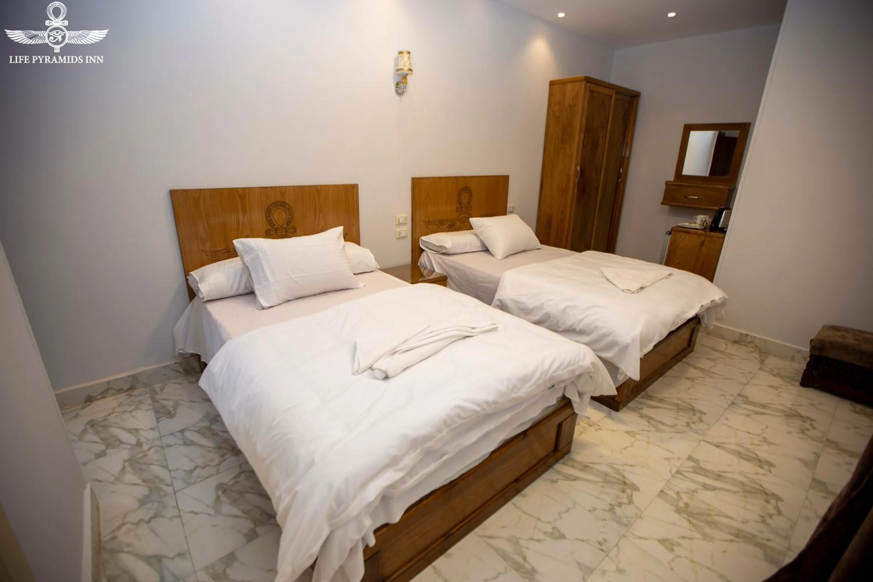 Bed in Life Pyramids Inn