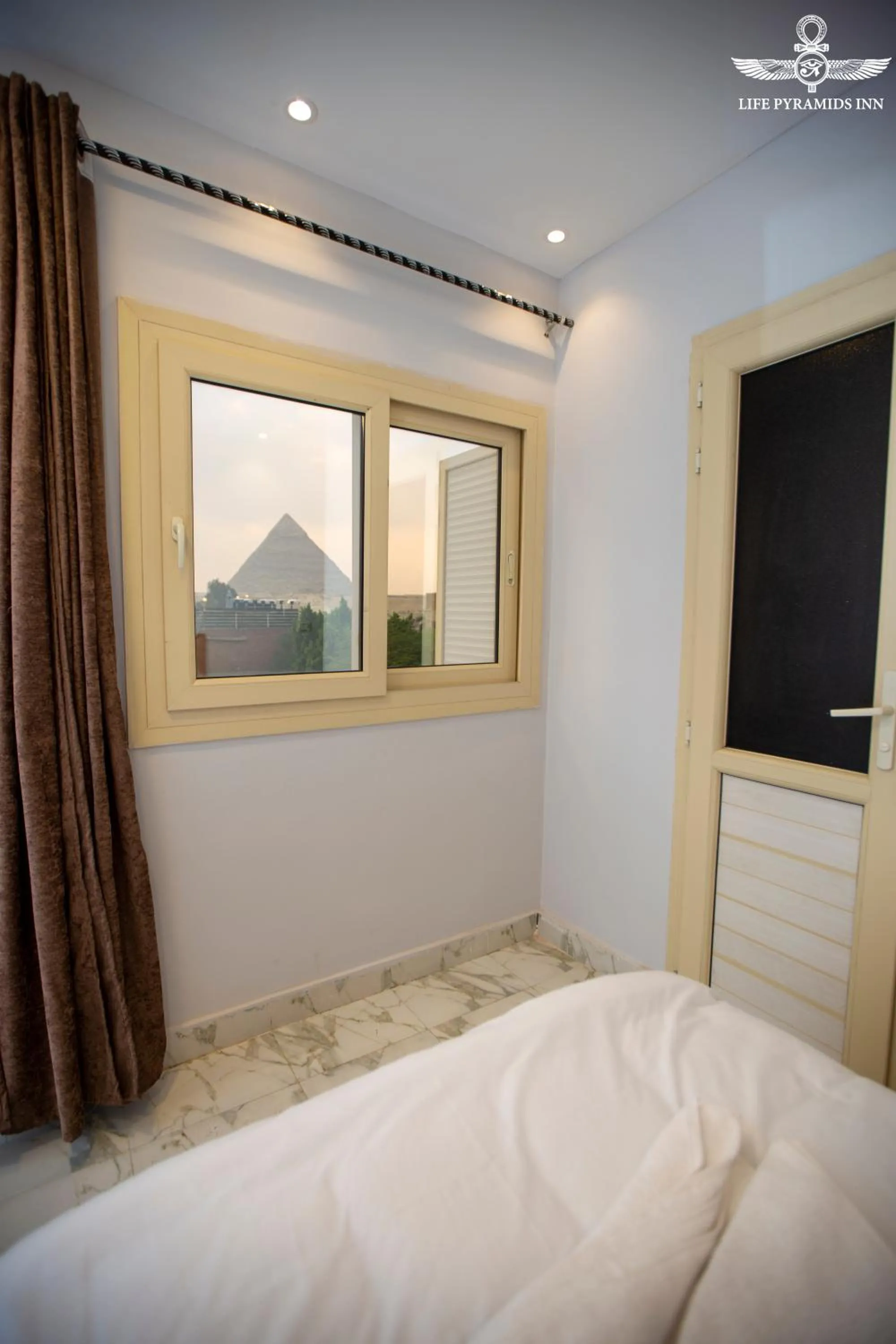 Bed in Life Pyramids Inn