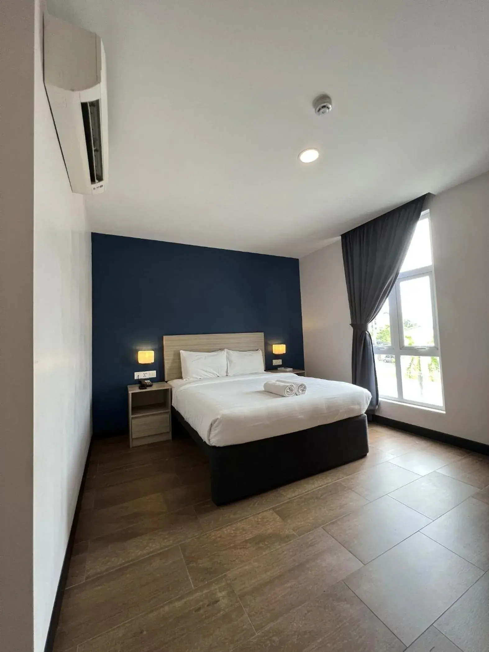 Photo of the whole room, Bed in ZONE Hotels, Telok Panglima Garang