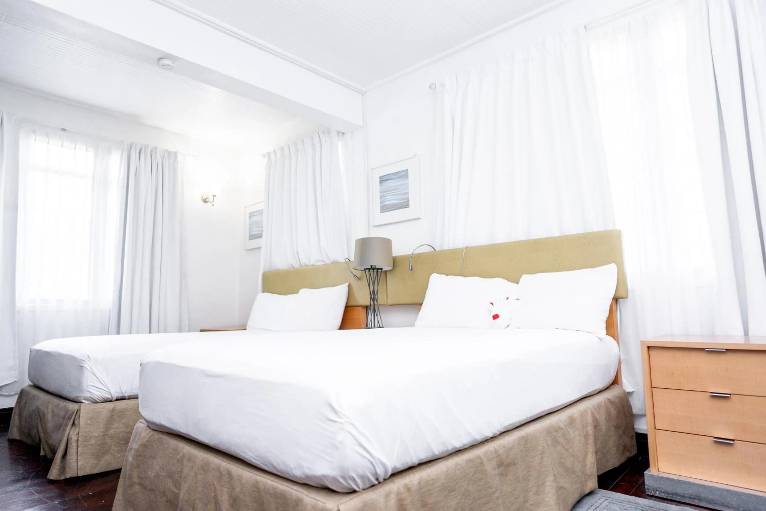 Bed in Ocean's Edge Lodge Restaurant & Bar