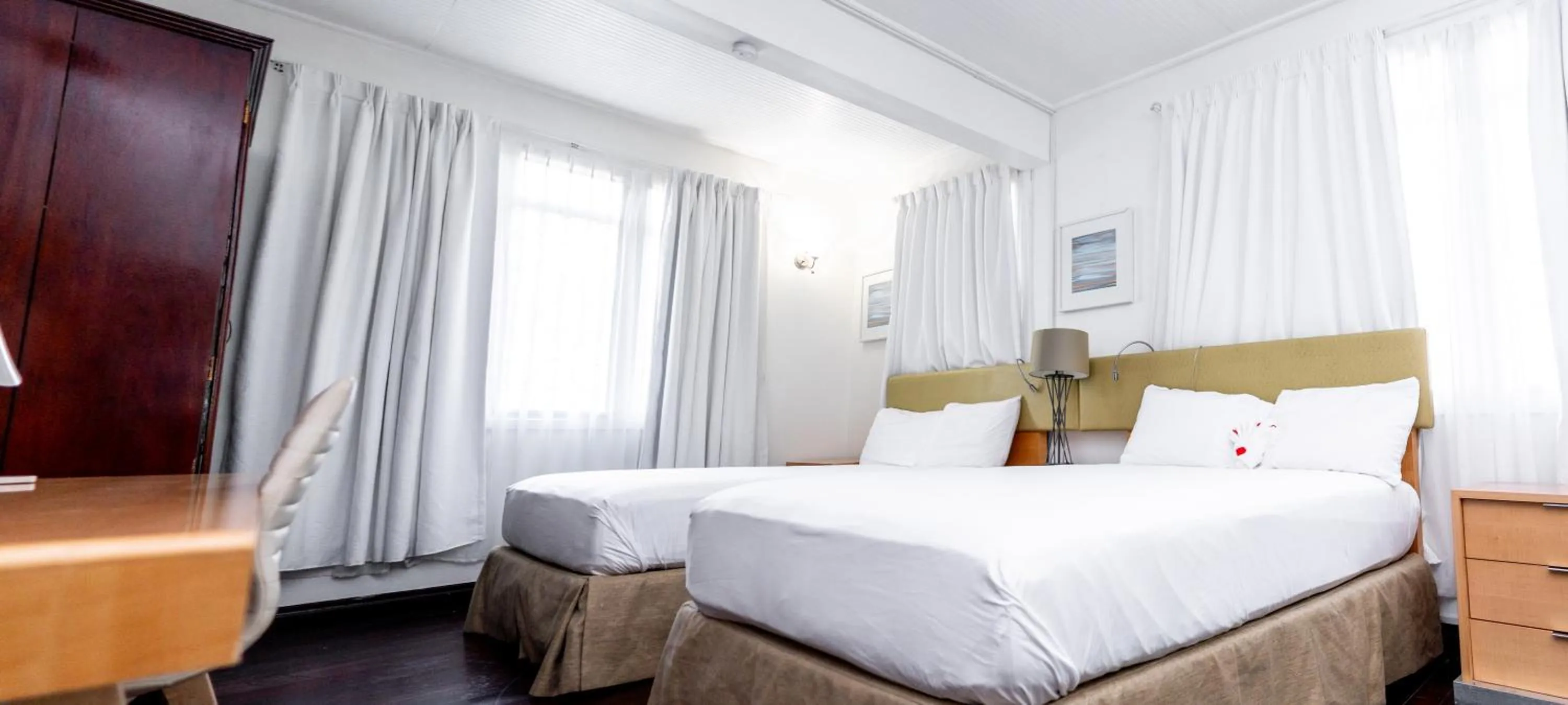 Bed in Ocean's Edge Lodge Restaurant & Bar