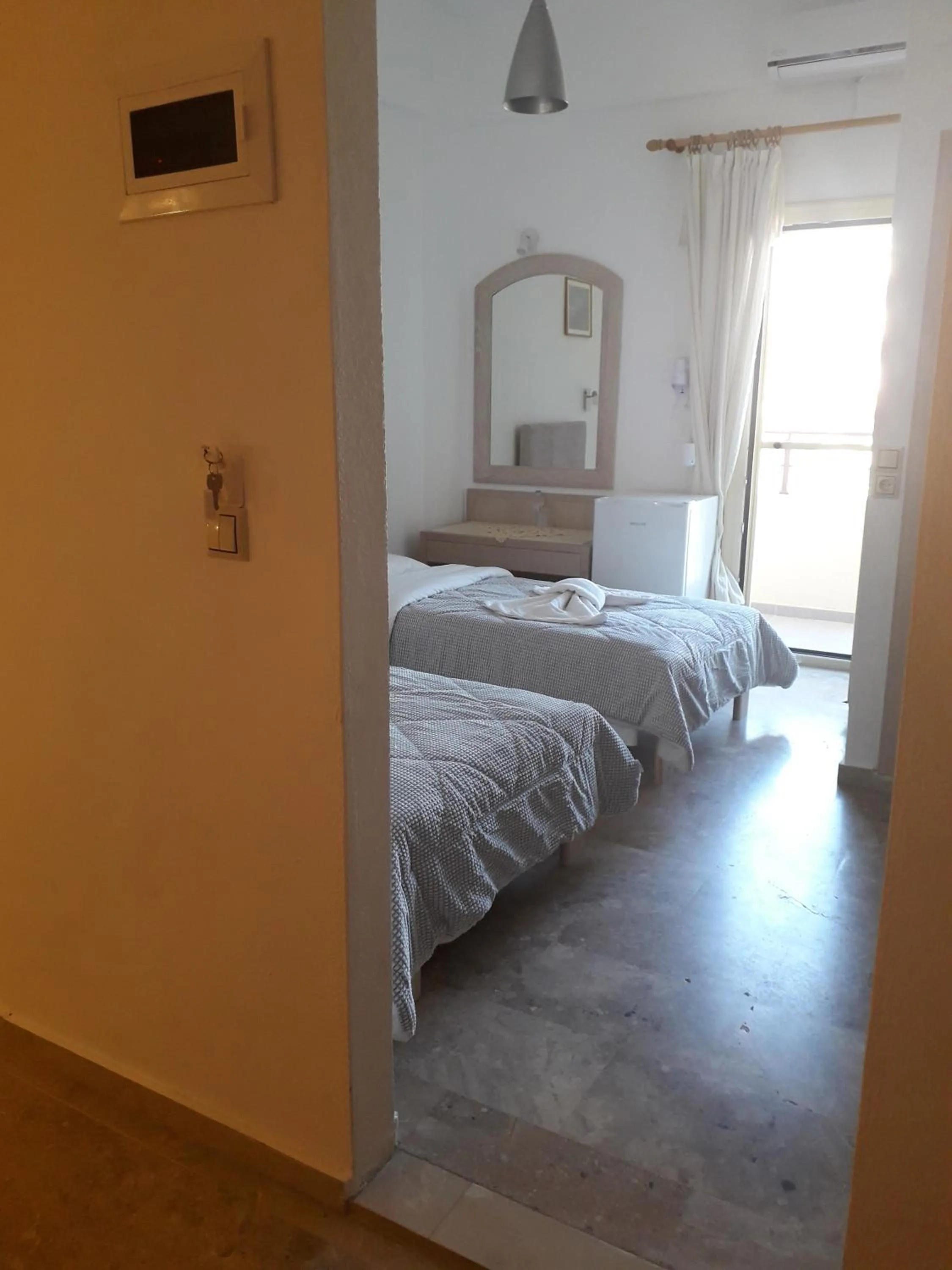 Bed in Knossos Hotel
