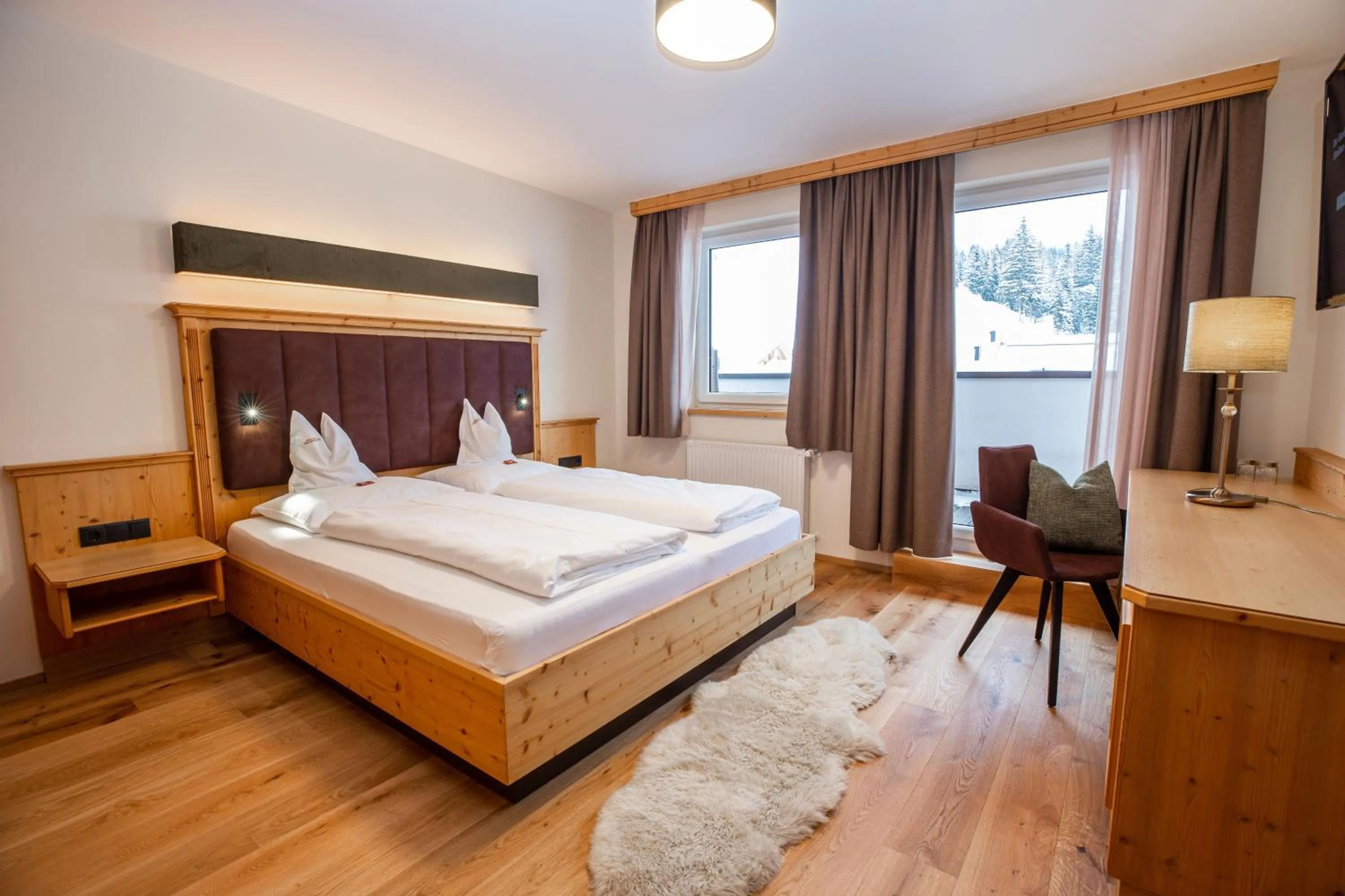 Photo of the whole room, Bed in Moseralm Dolomiti Hideaway