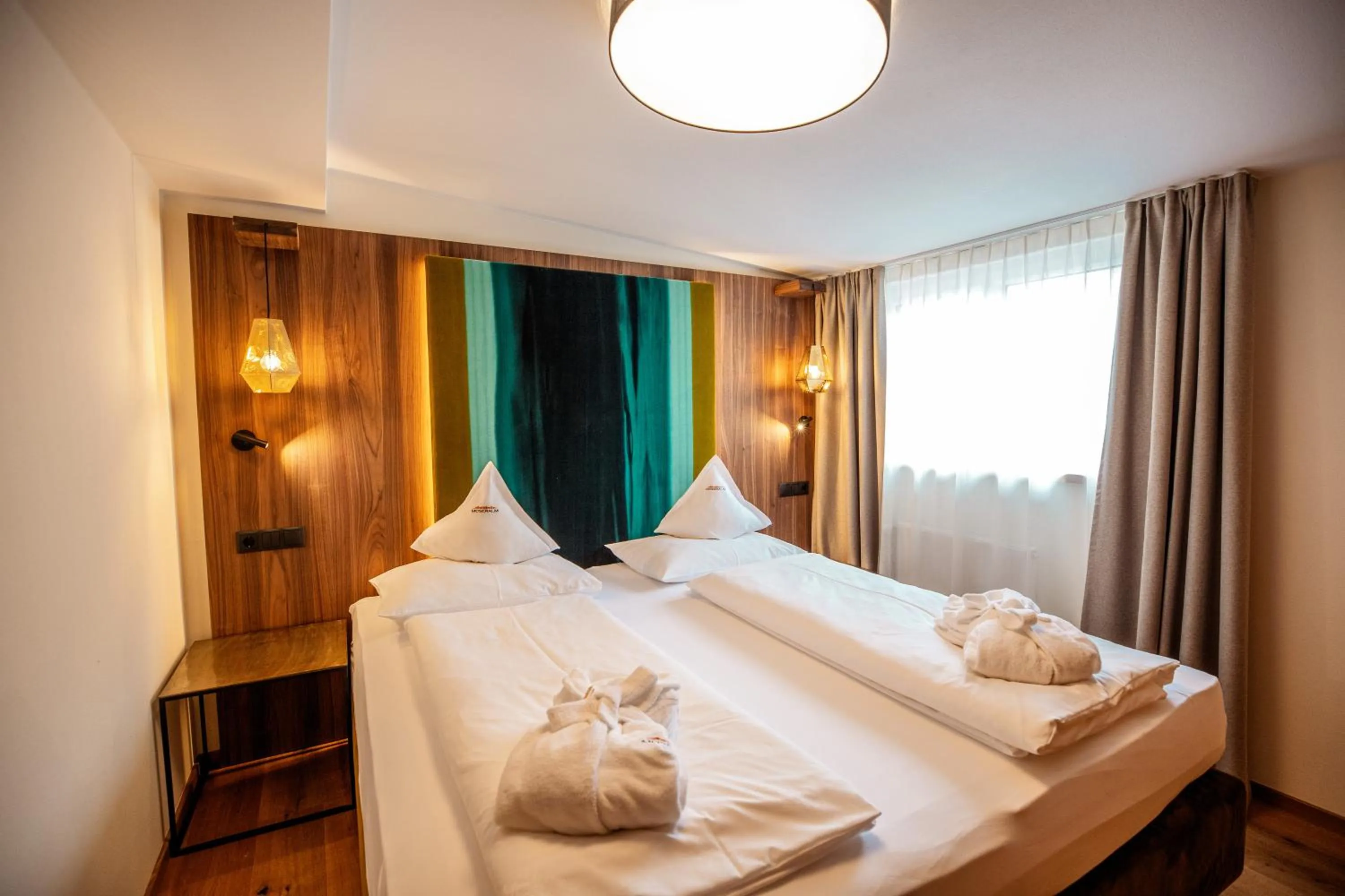 Photo of the whole room, Bed in Moseralm Dolomiti Hideaway