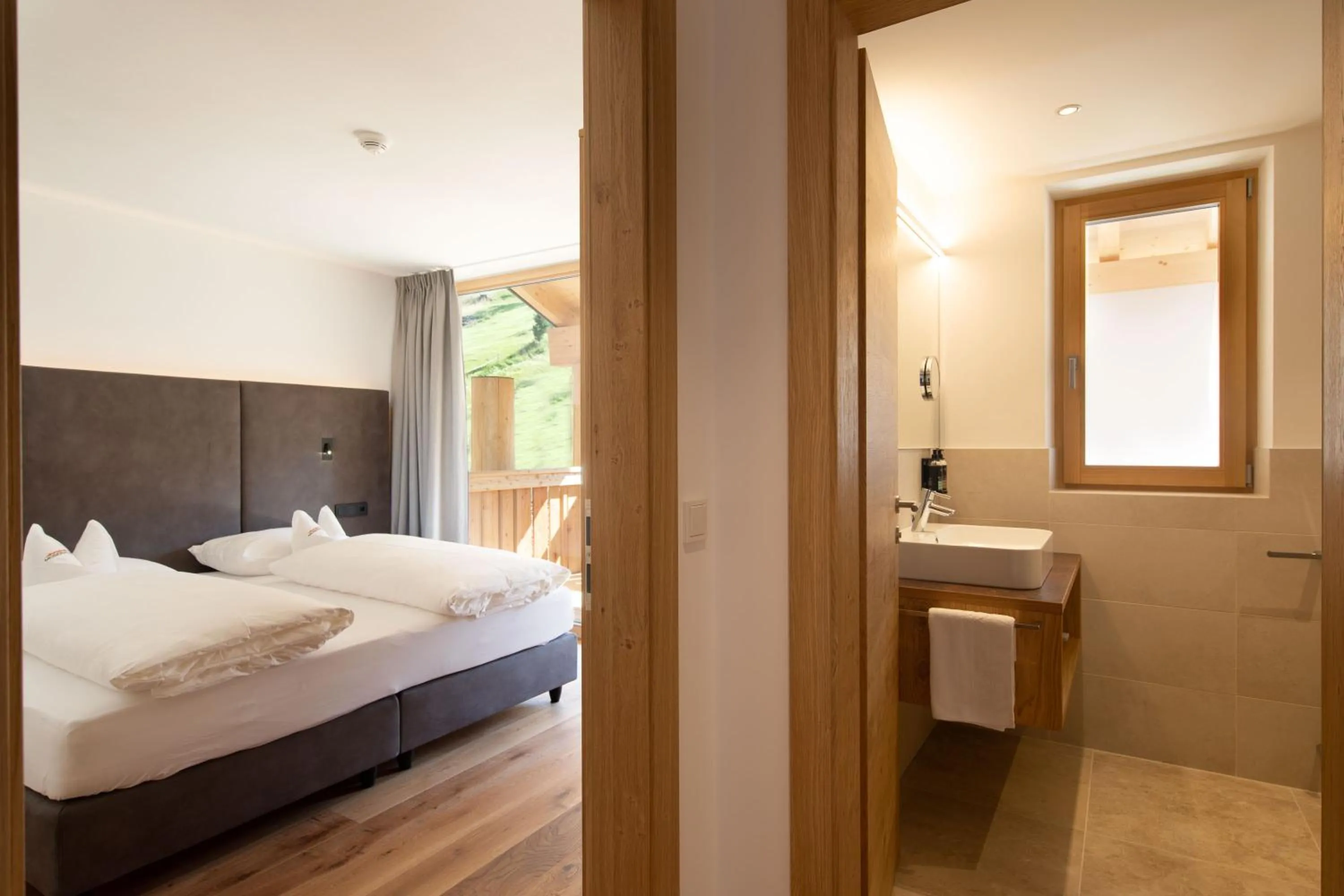 Bedroom, Bed in Moseralm Dolomiti Hideaway