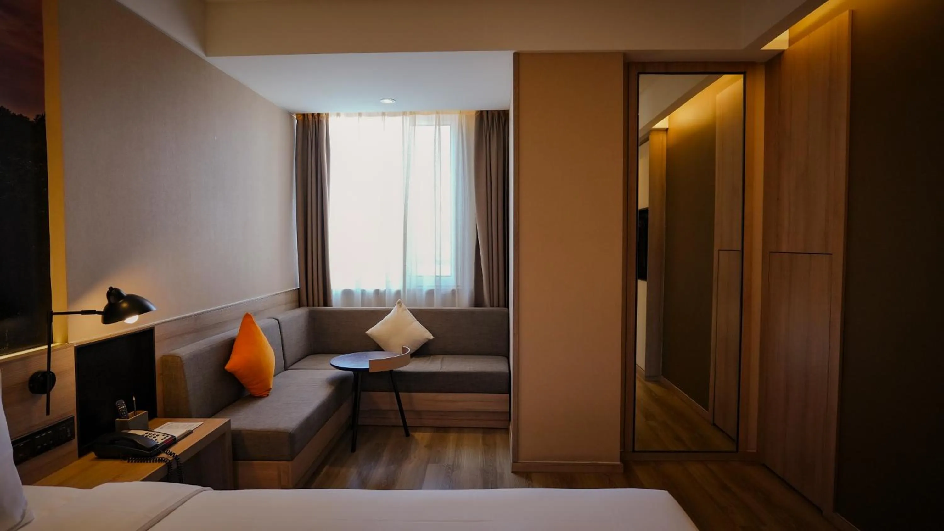 Seating area, Bed in Atour Hotel Harbin Convention and Exhibition Center