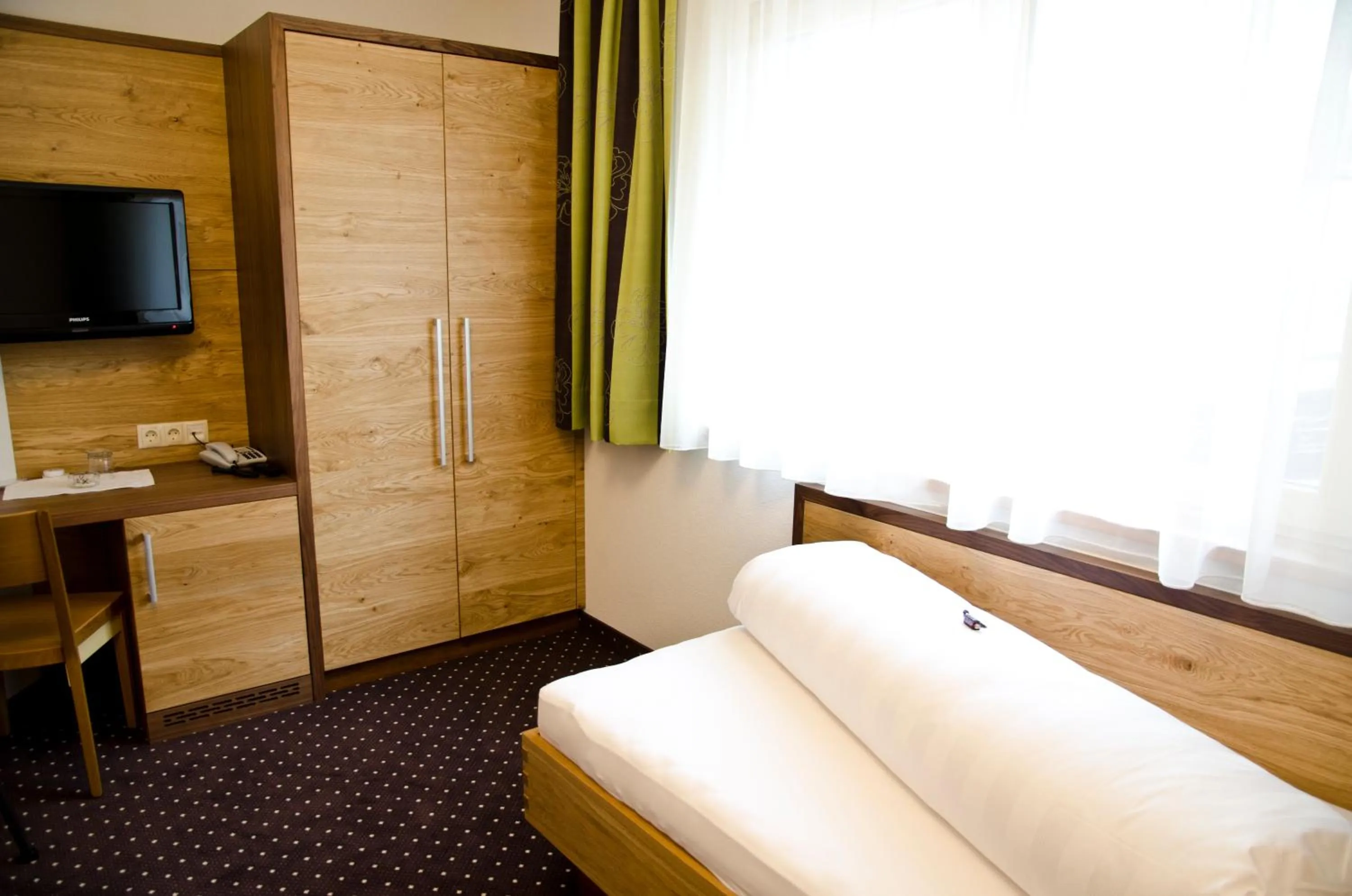 Bedroom, Bed in Hotel Garni Arosa
