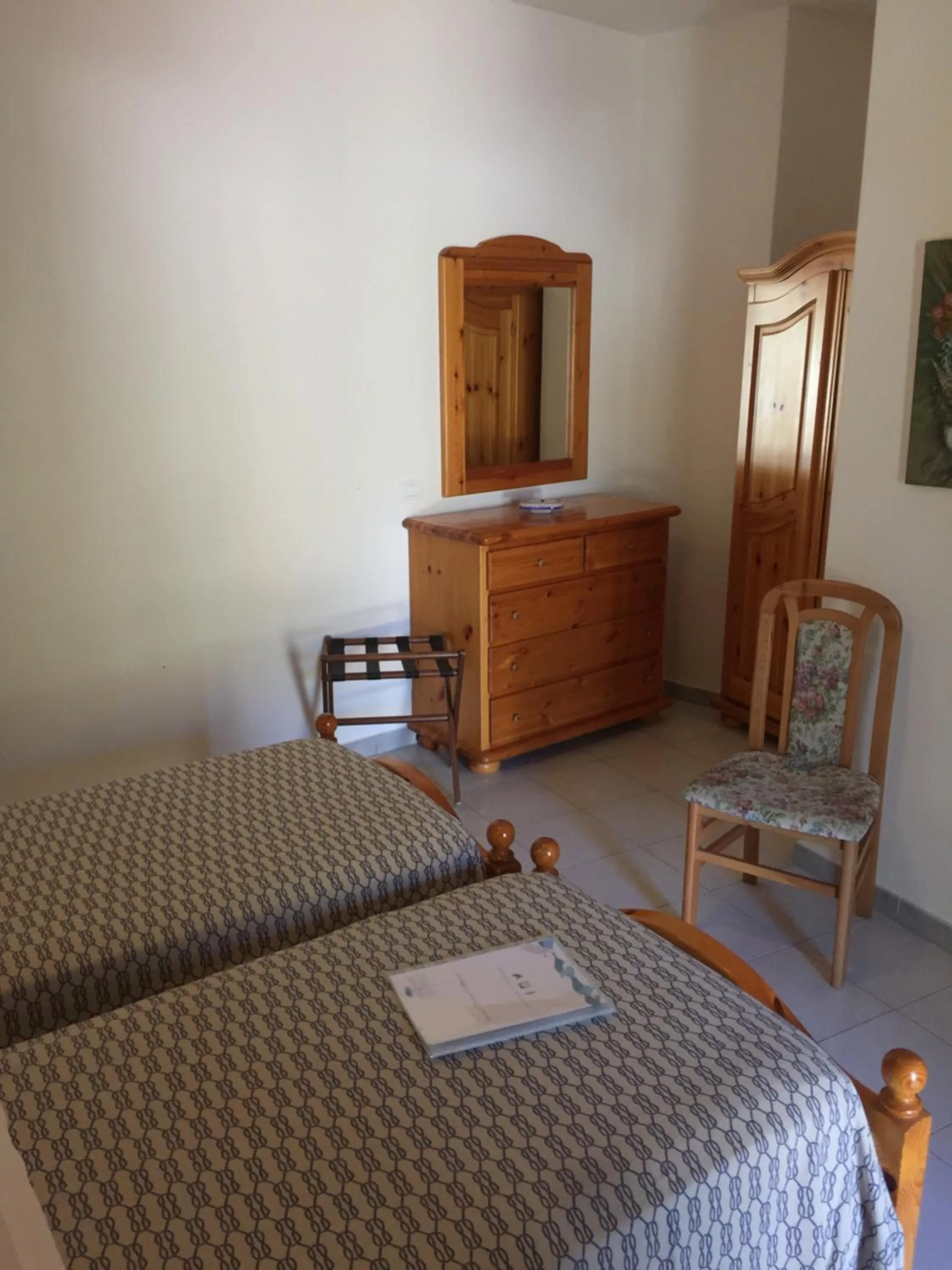 Bed in Albergo Villa Mario