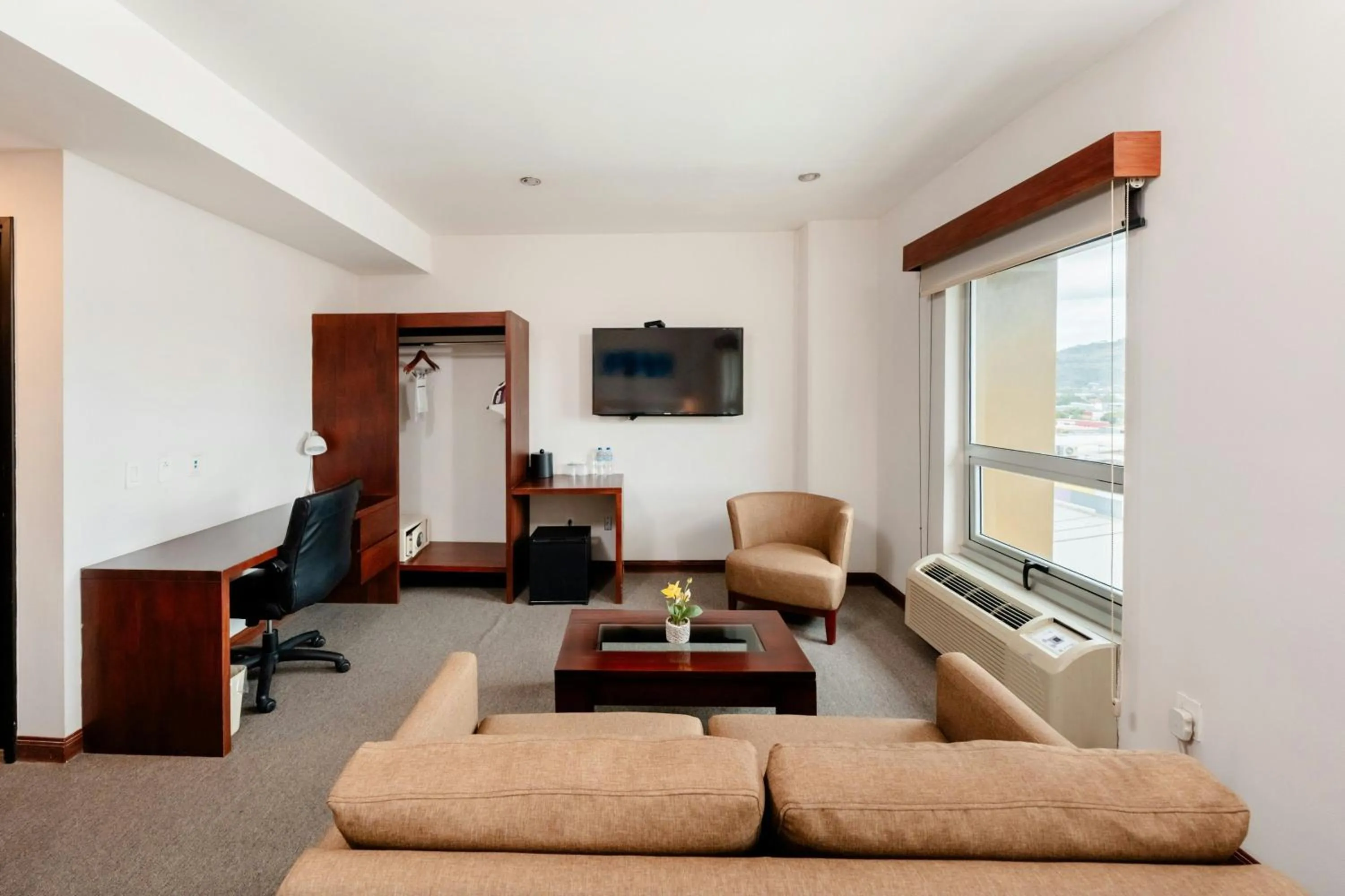 Living room in City Express by Marriott Esteli