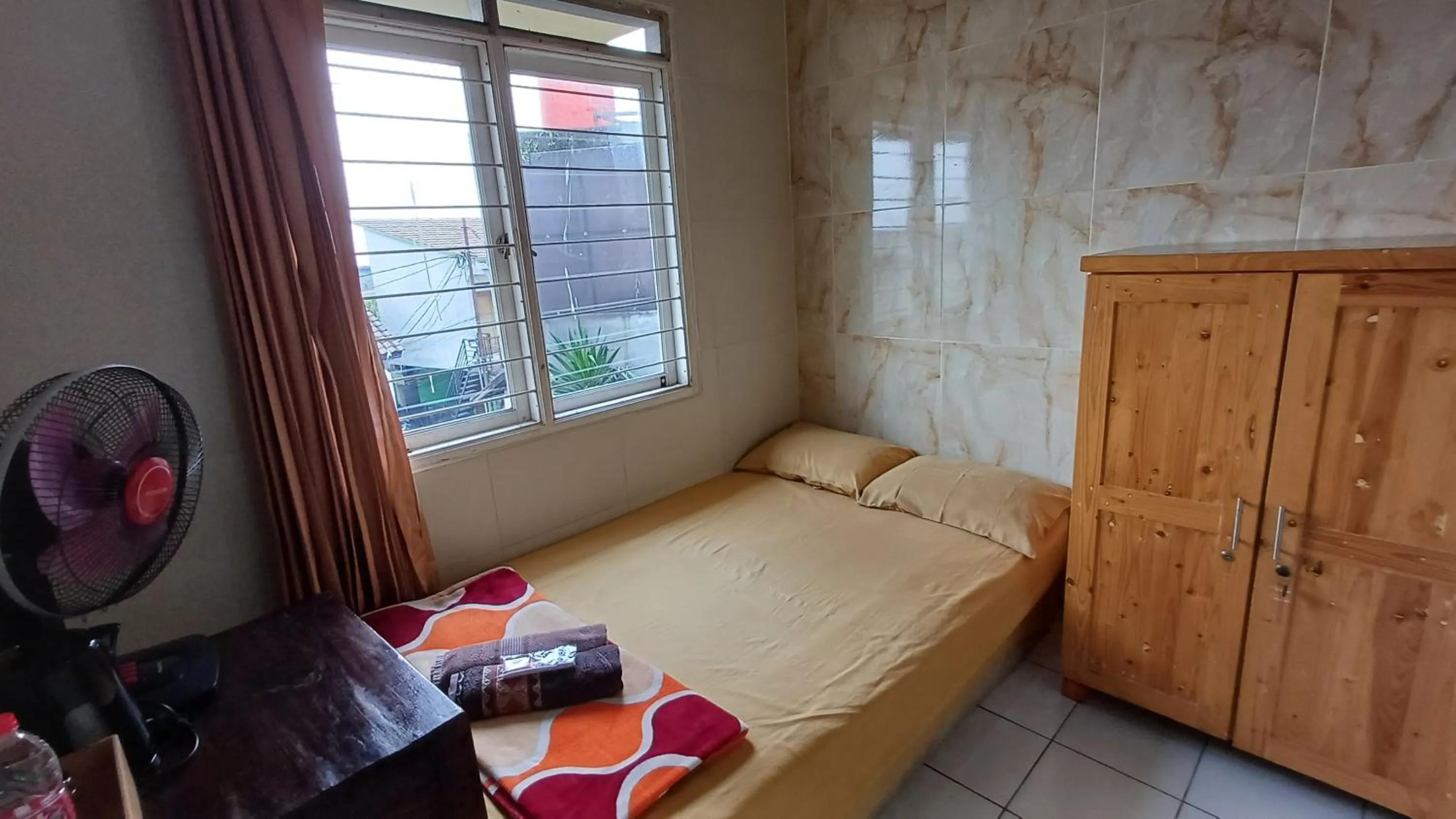 Bedroom, Bed in Kost Carmelia Syariah Baranangsiang Bogor