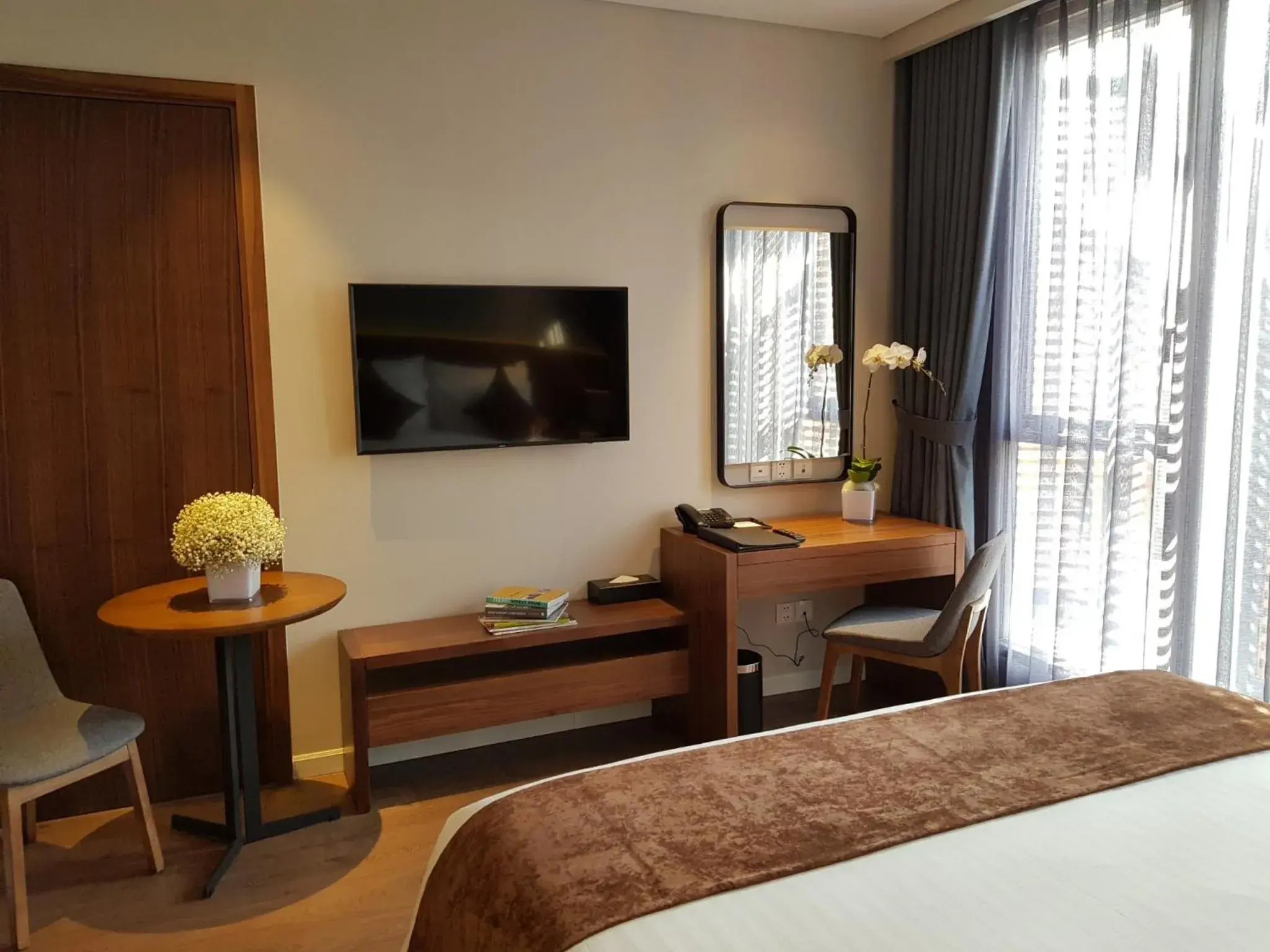 Bed in Orchid Boutique Hotel & Apartment Bed in Orchid Boutique Hotel & Apartment