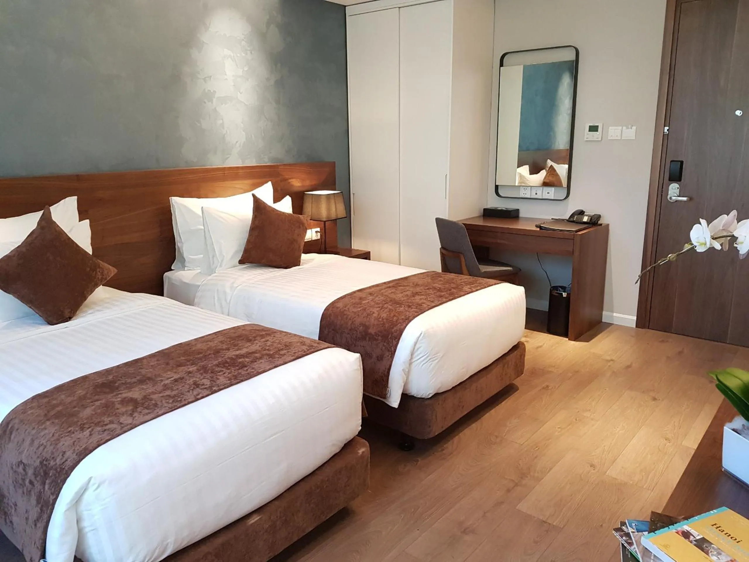 Bed in Orchid Boutique Hotel & Apartment