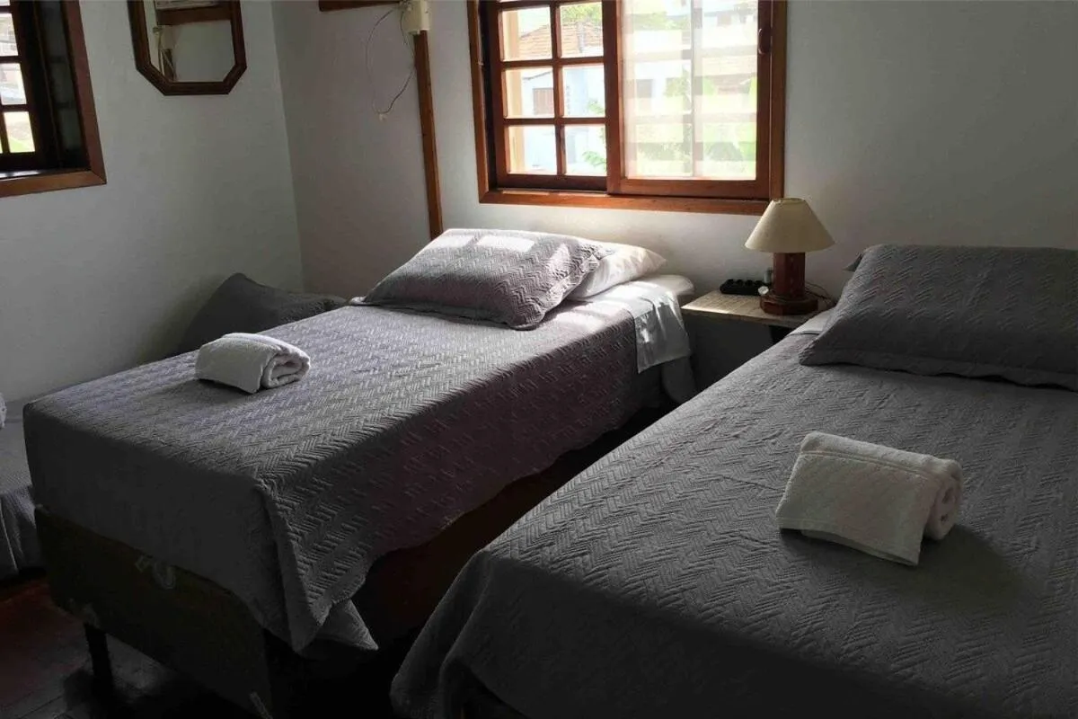 Bed in Pousada Canajurê