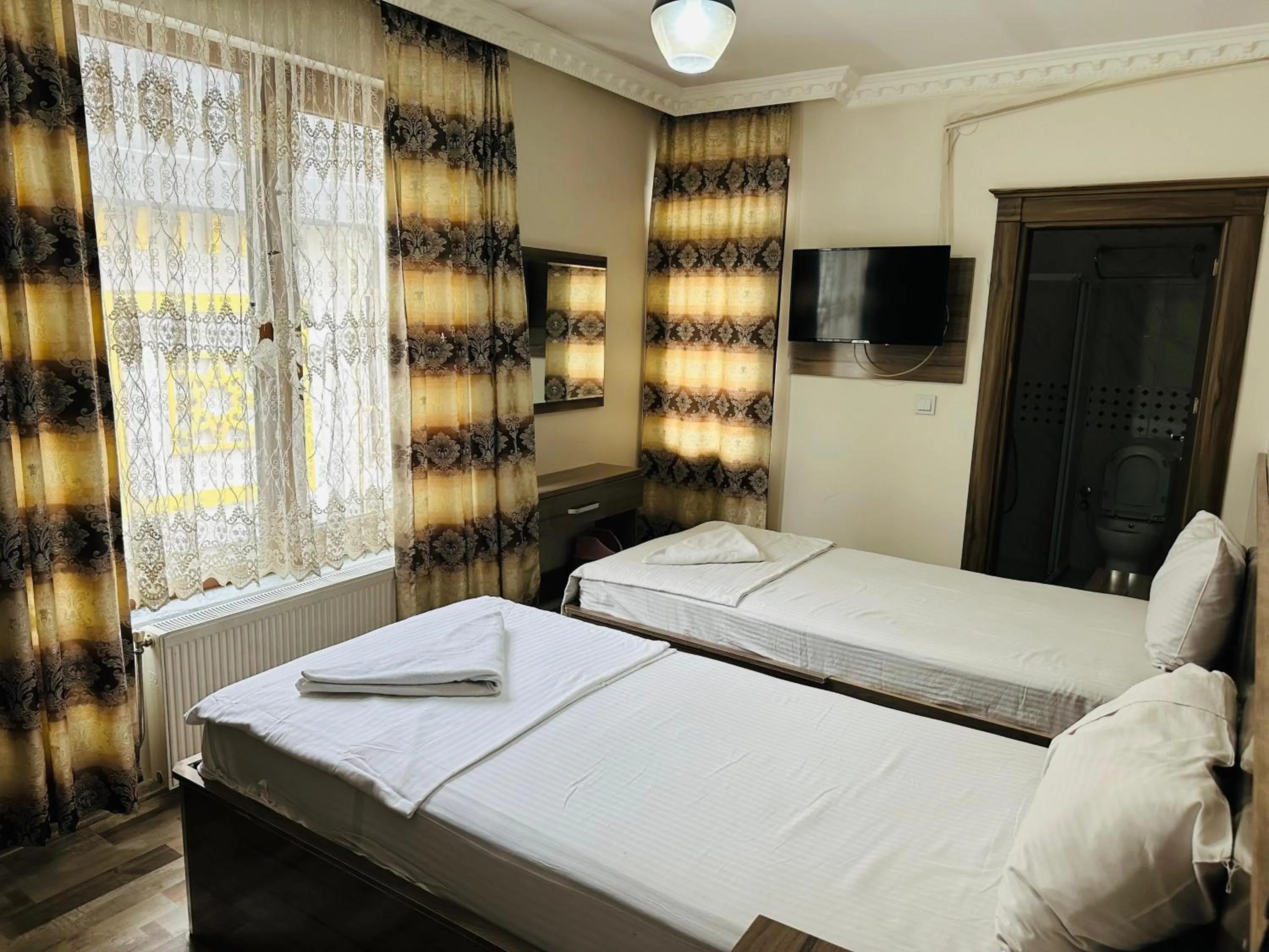 Bed in Toprak Hotel