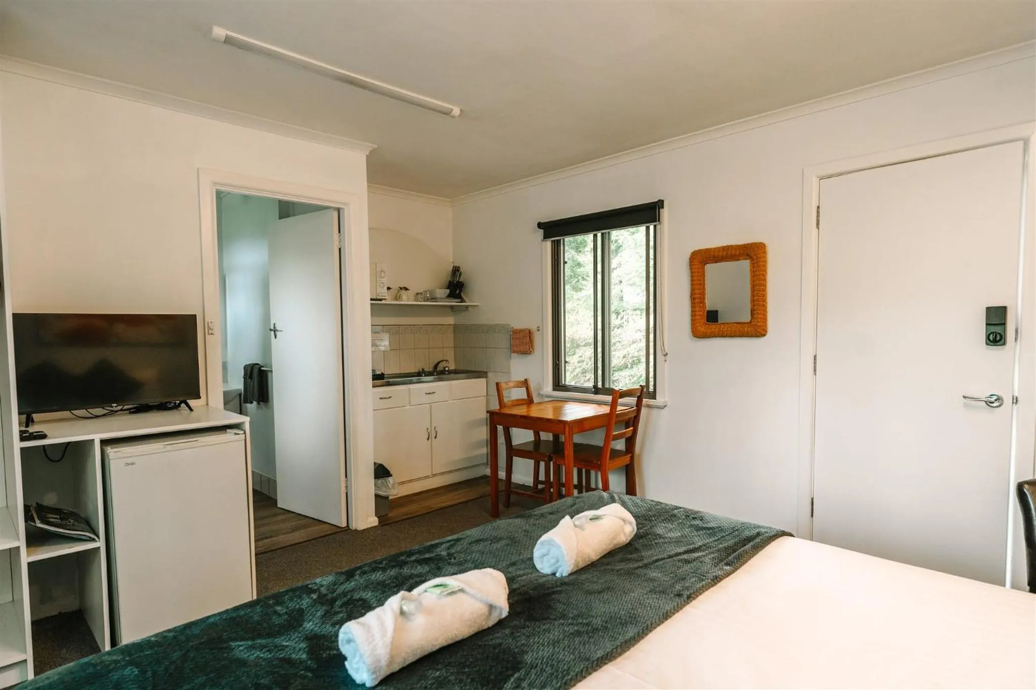Bed in Alpine Riverside Cottages