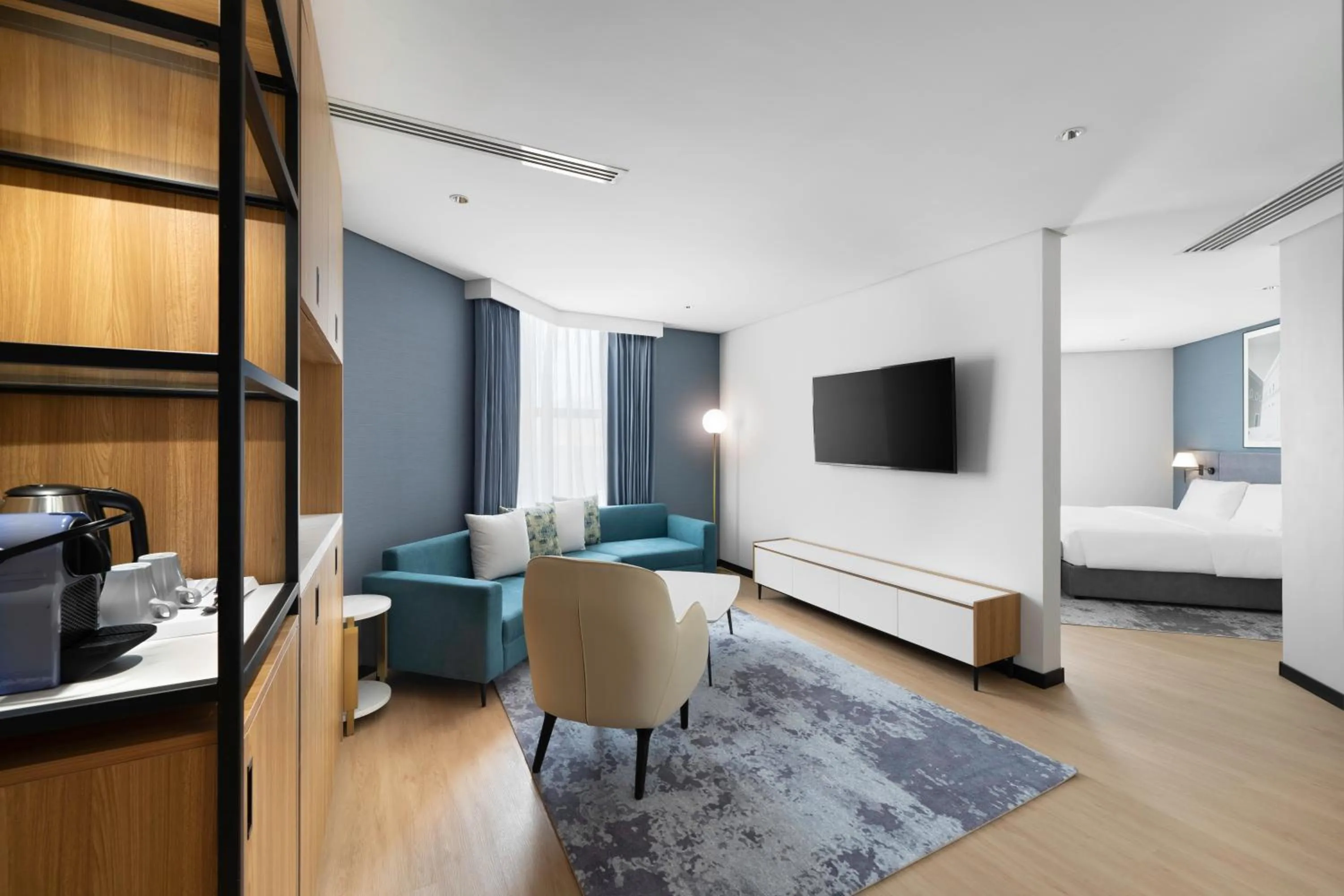 Communal lounge/ TV room, Bed in Park Inn by Radisson Al Khobar