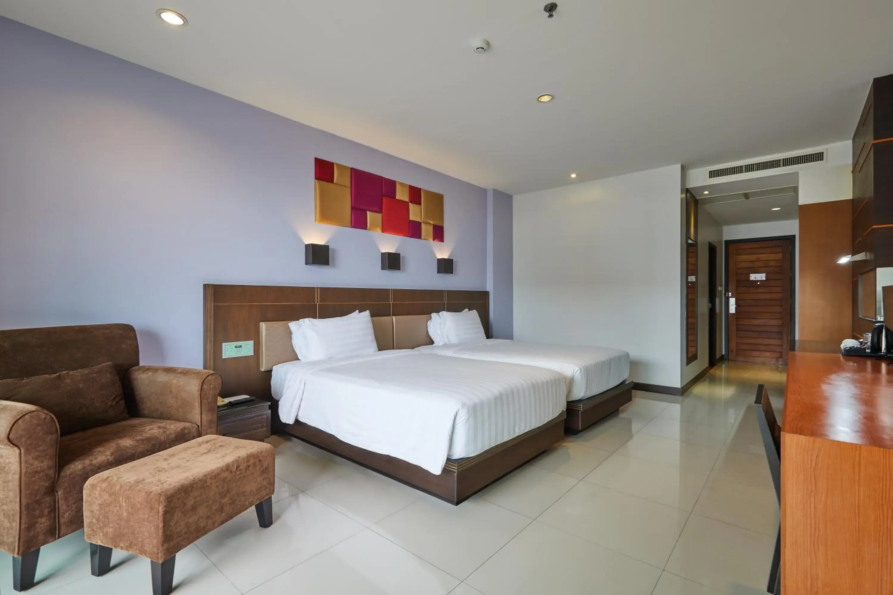 Bed in Welcome World Beachfront Resort Bed in Welcome World Beachfront Resort