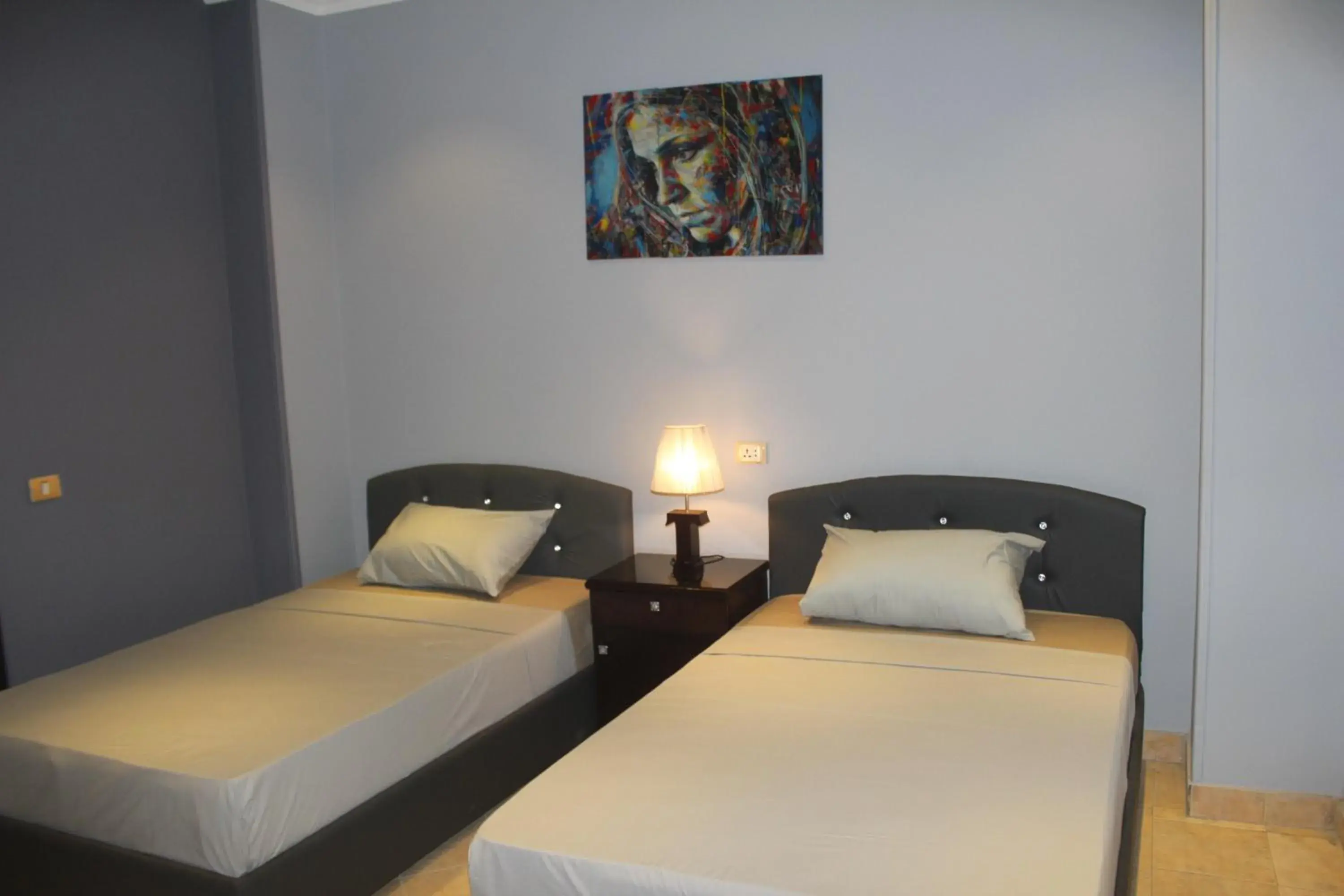 Triple Room with Balcony - single occupancy in Tahrir Square Hostel Triple Room with Balcony - single occupancy in Tahrir Square Hostel