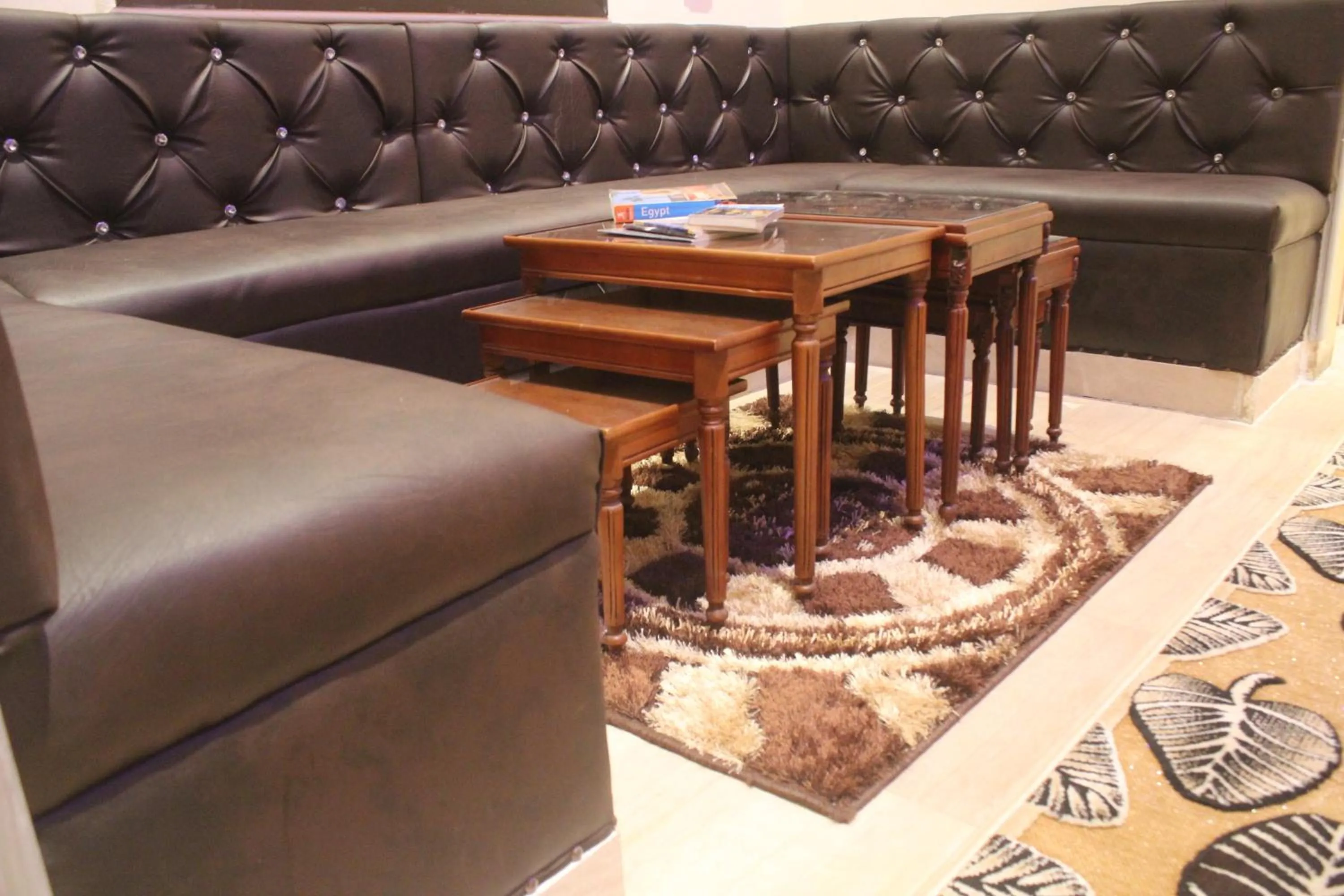 Communal lounge/ TV room in Tahrir Square Hostel