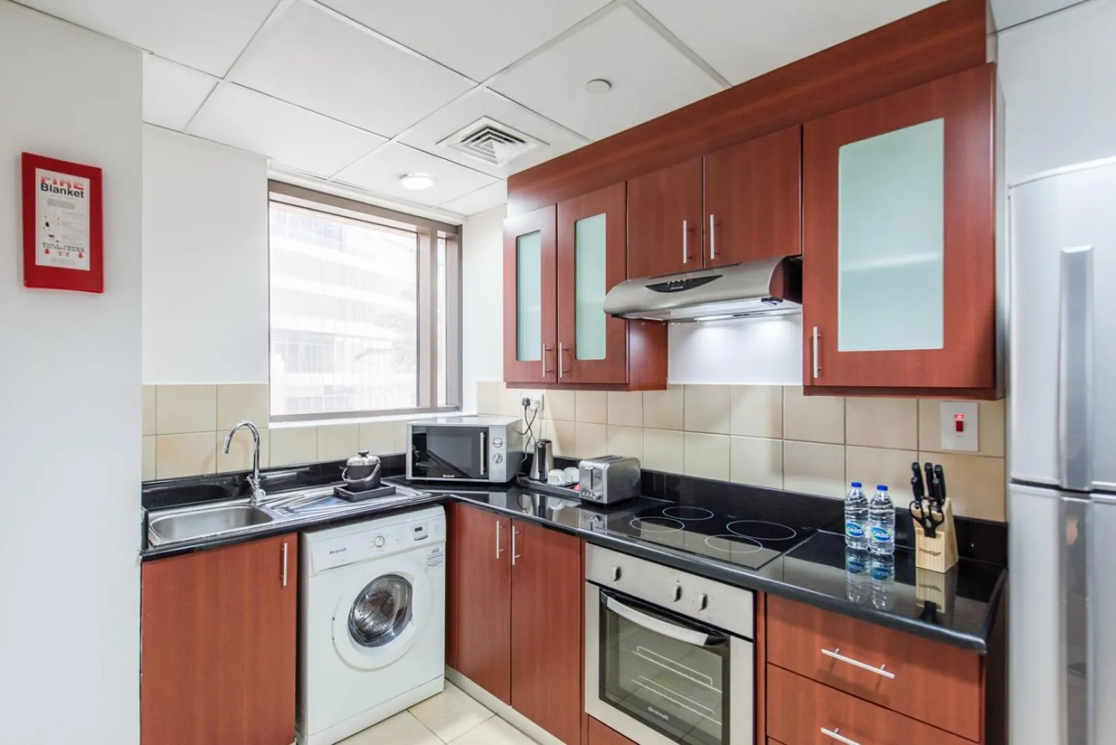 Kitchen or kitchenette in SUHA JBR Hotel Apartments
