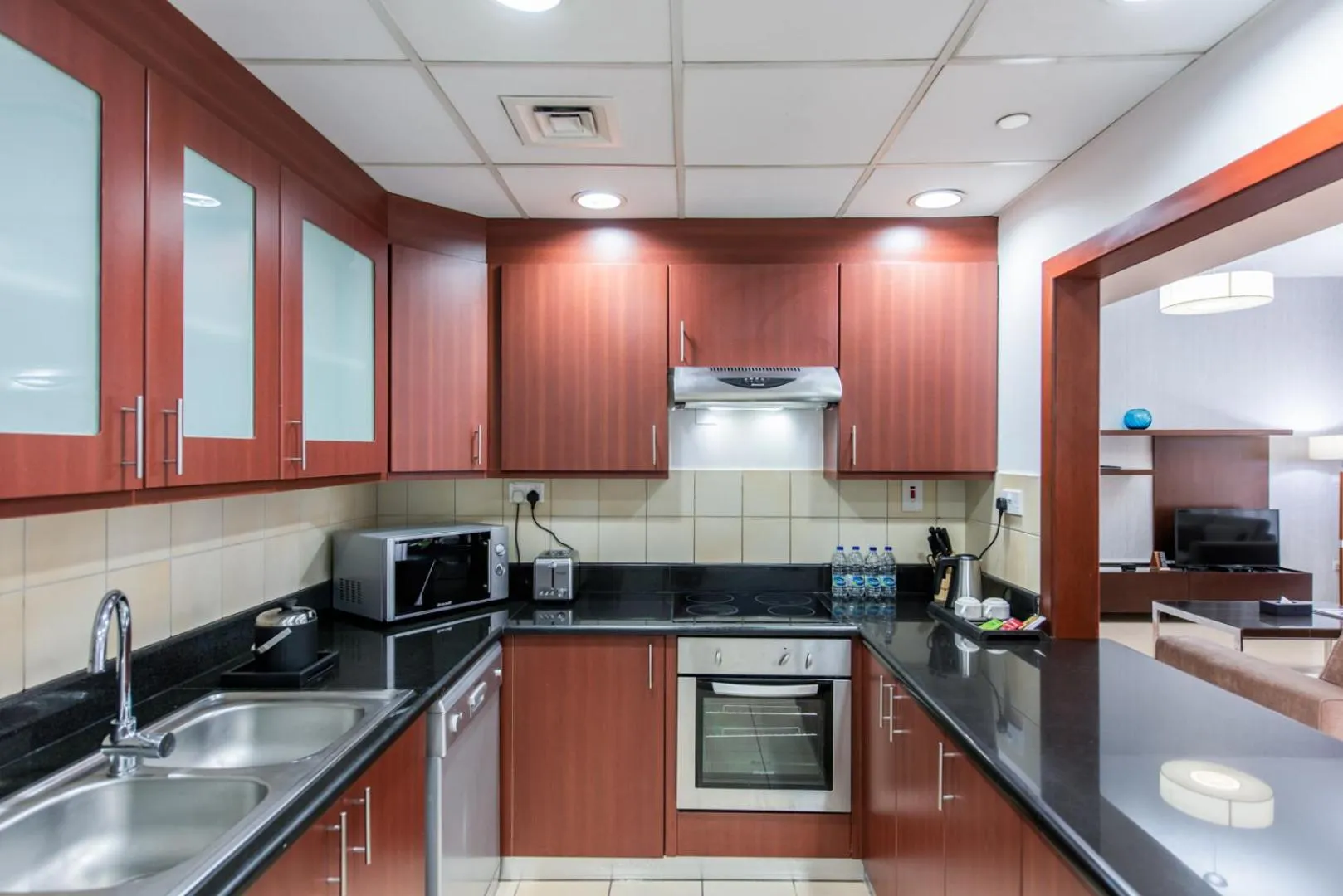 Kitchen or kitchenette in SUHA JBR Hotel Apartments