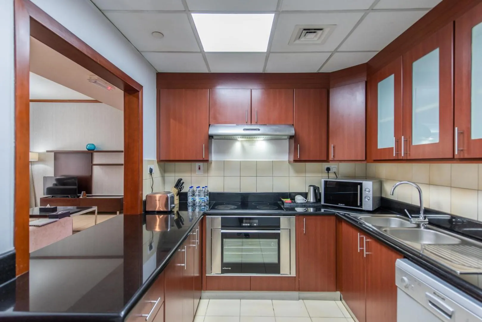 Kitchen or kitchenette in SUHA JBR Hotel Apartments